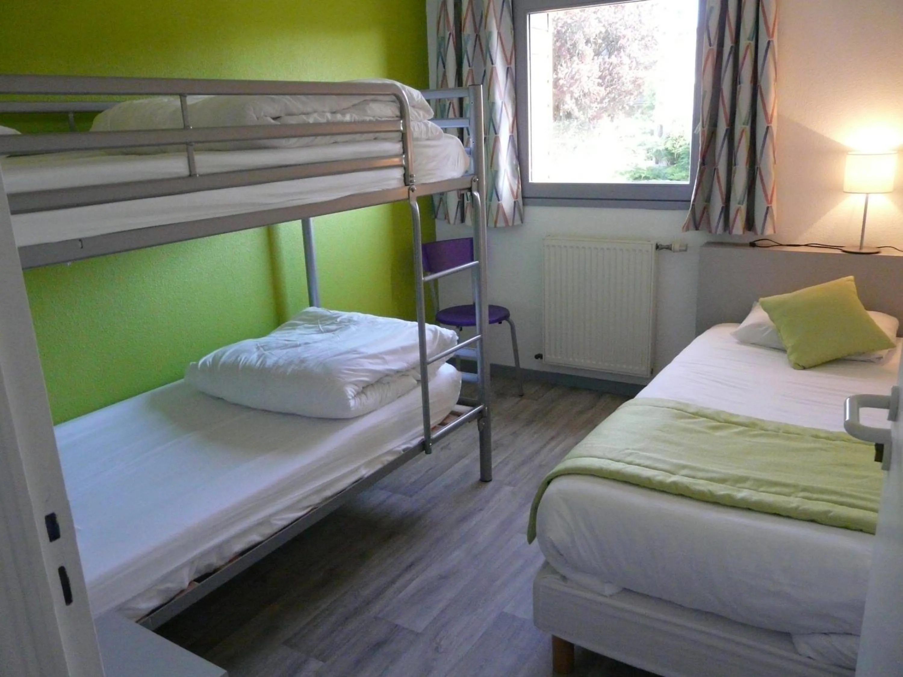 Bed in Hôtel de la baie de Paimpol