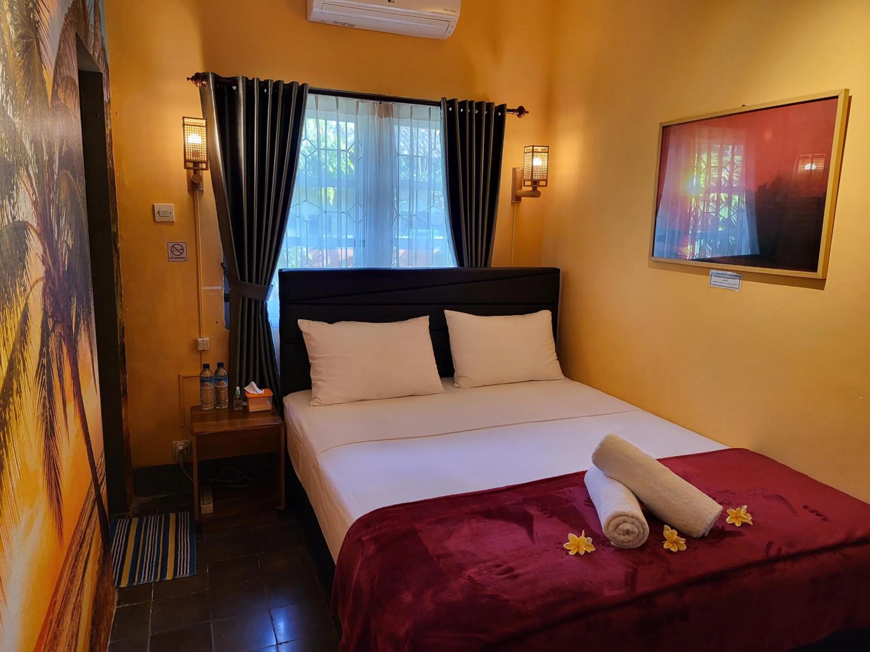 Bedroom, Bed in Dewi Sri Guesthouse