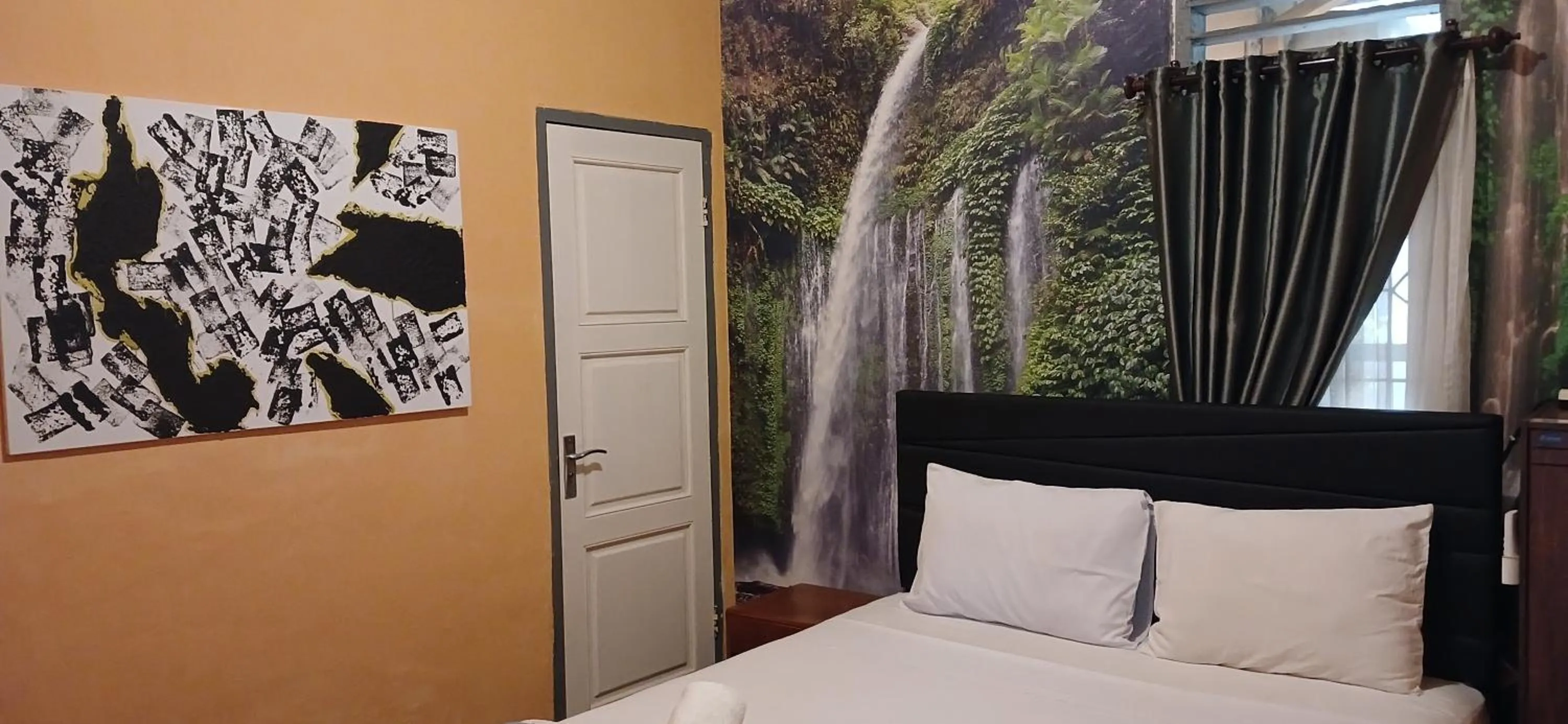 Bedroom, Bed in Dewi Sri Guesthouse