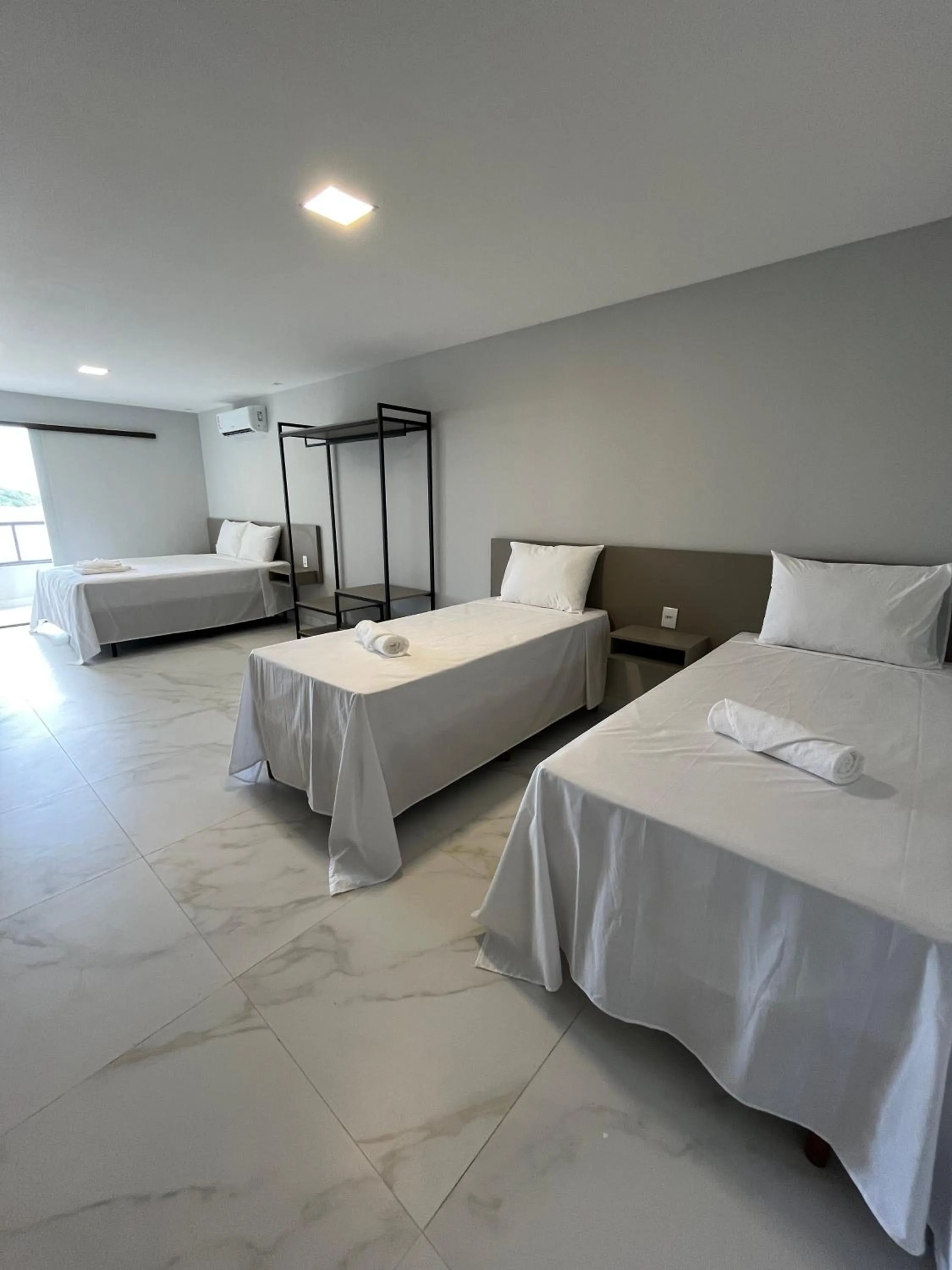 Bed in Piúma Palace Hotel