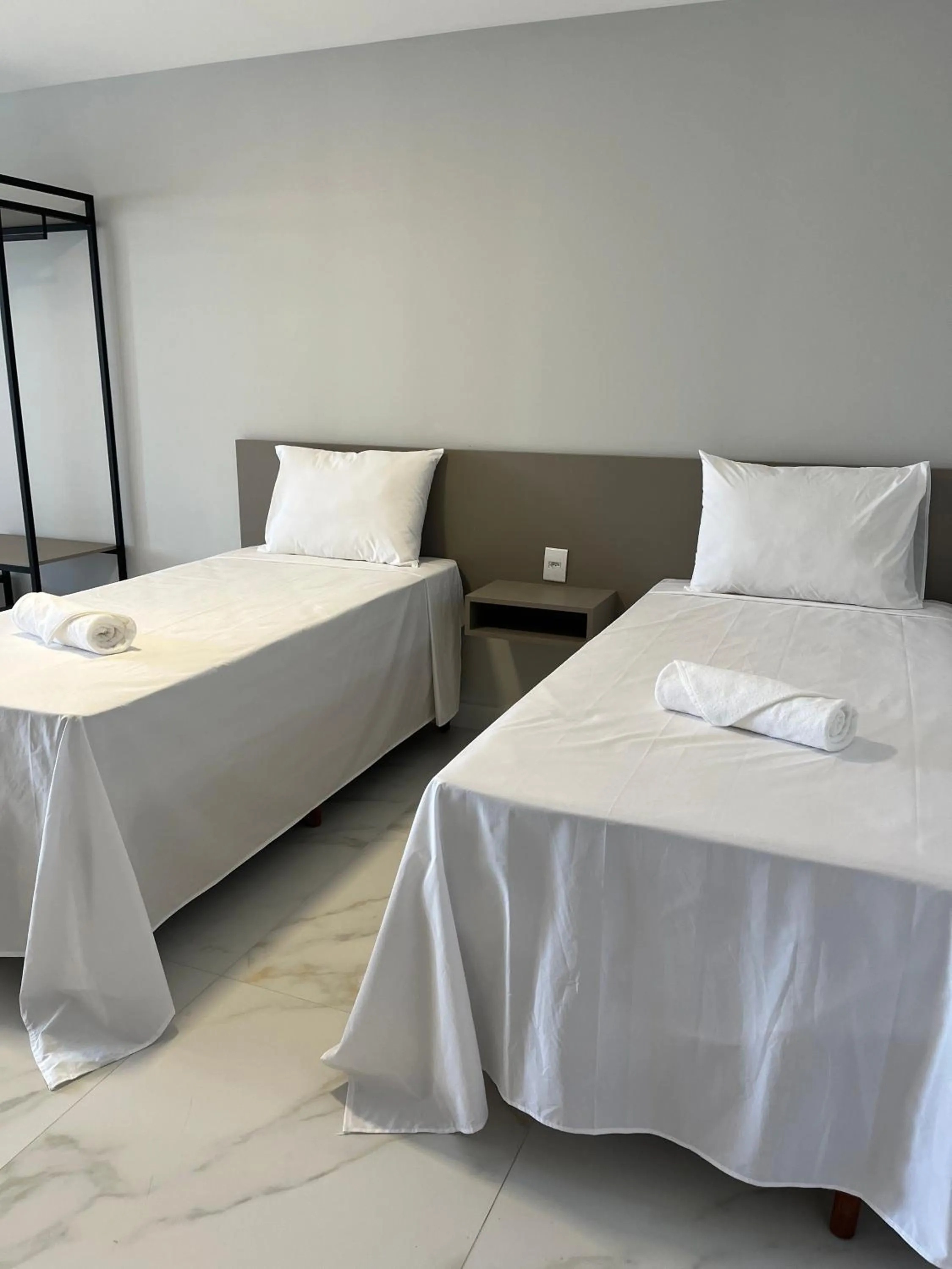 Bed in Piúma Palace Hotel