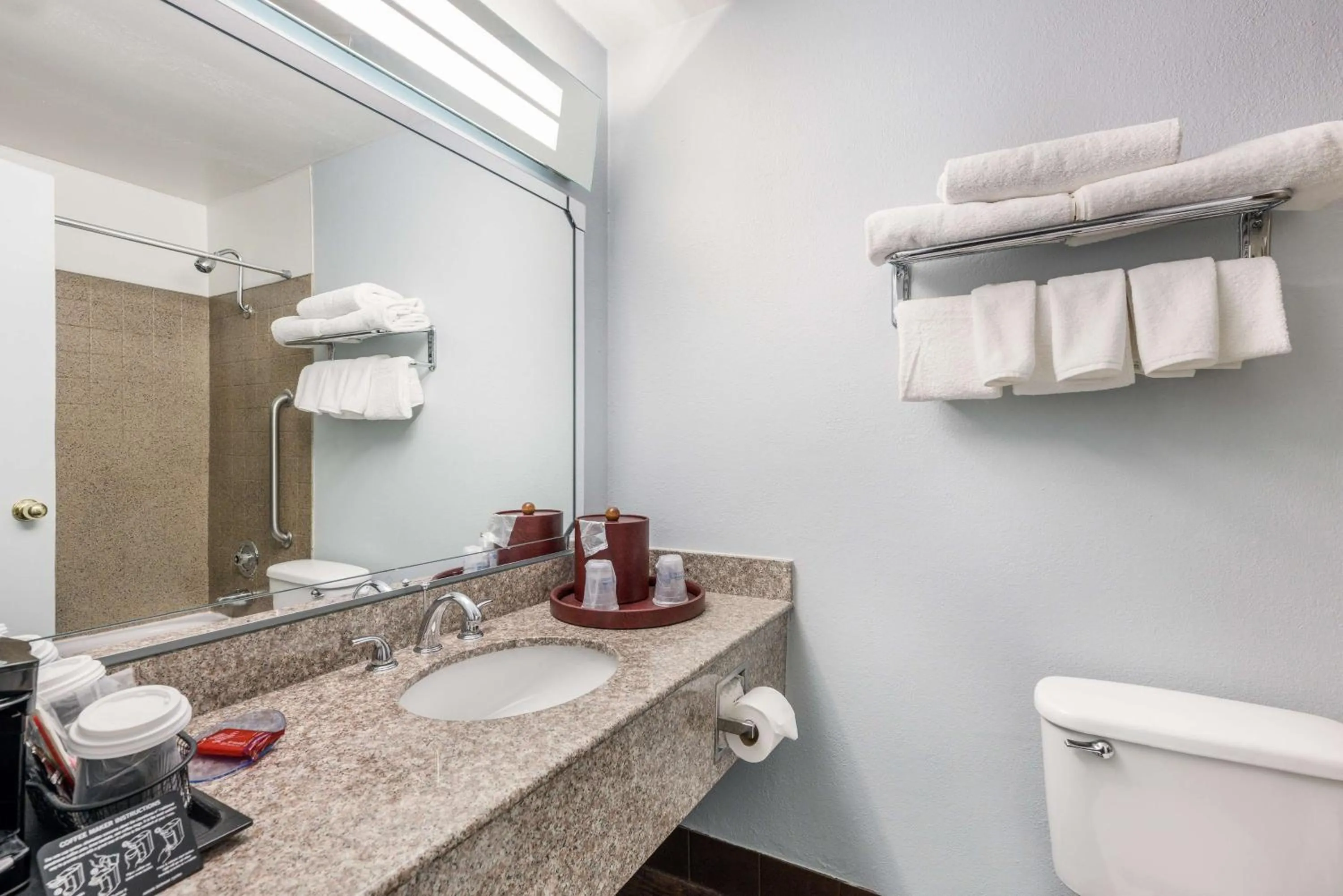 Bathroom in SureStay Hotel by Best Western SeaTac Airport North