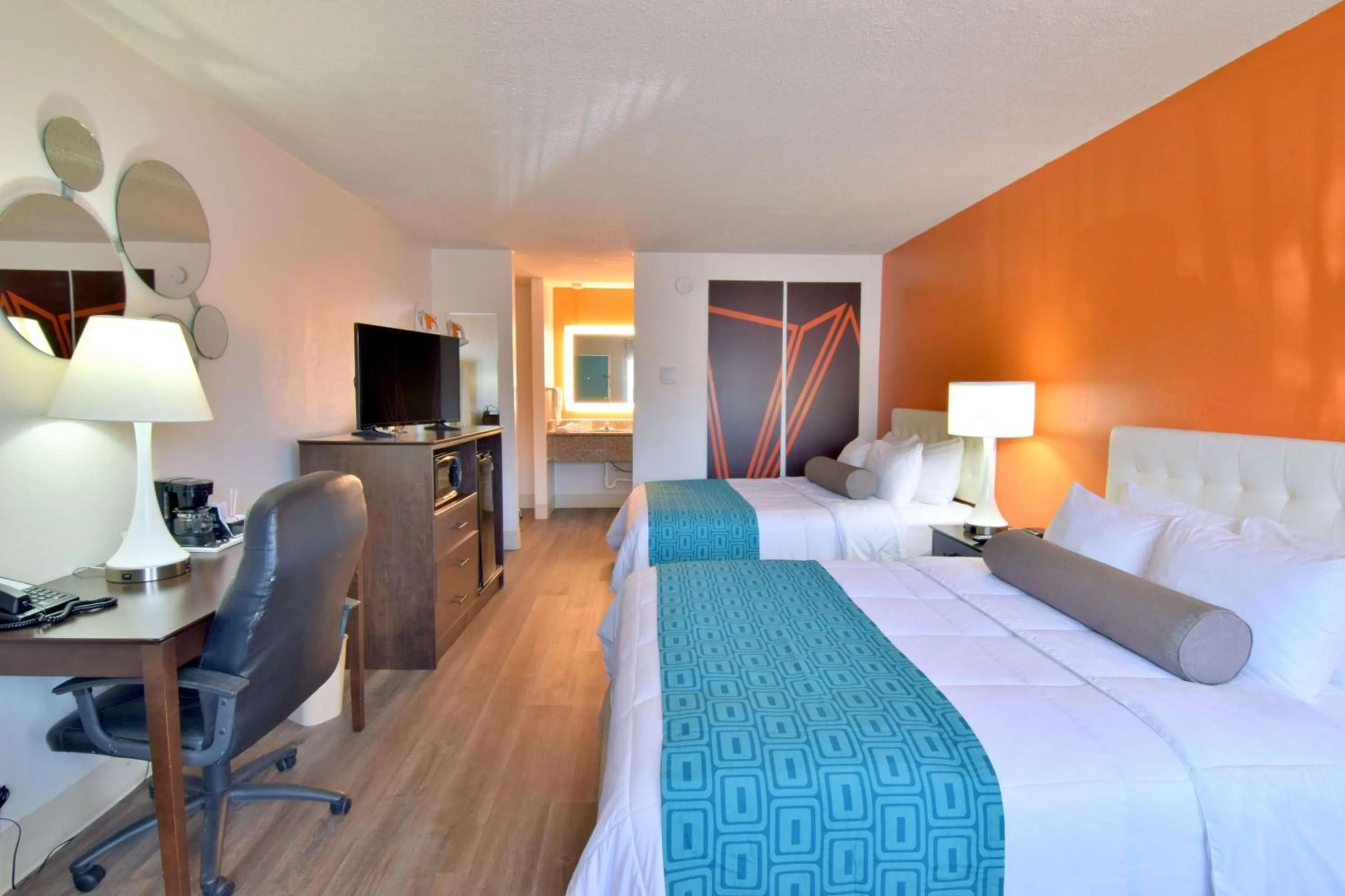 Bed in Howard Johnson by Wyndham Ocala FL I-75