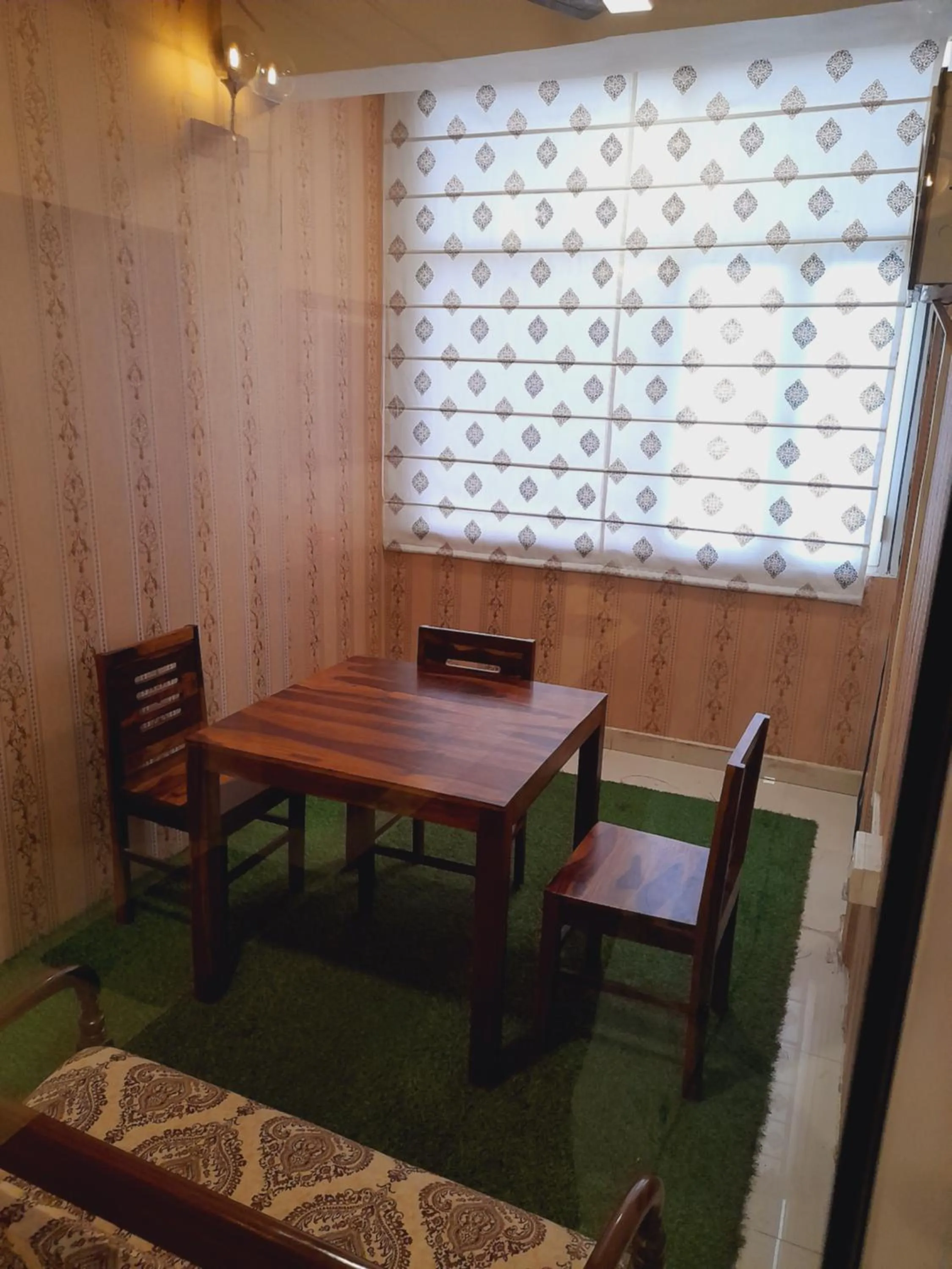 Seating area in Homestay Ac Dormitory