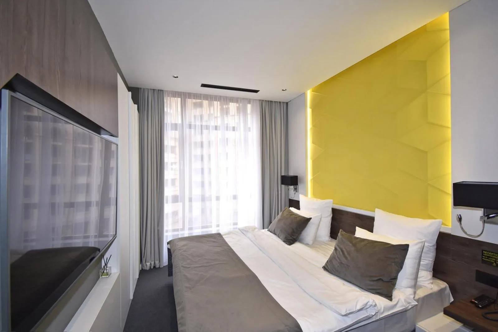 Bed in Avenue ApartHotel