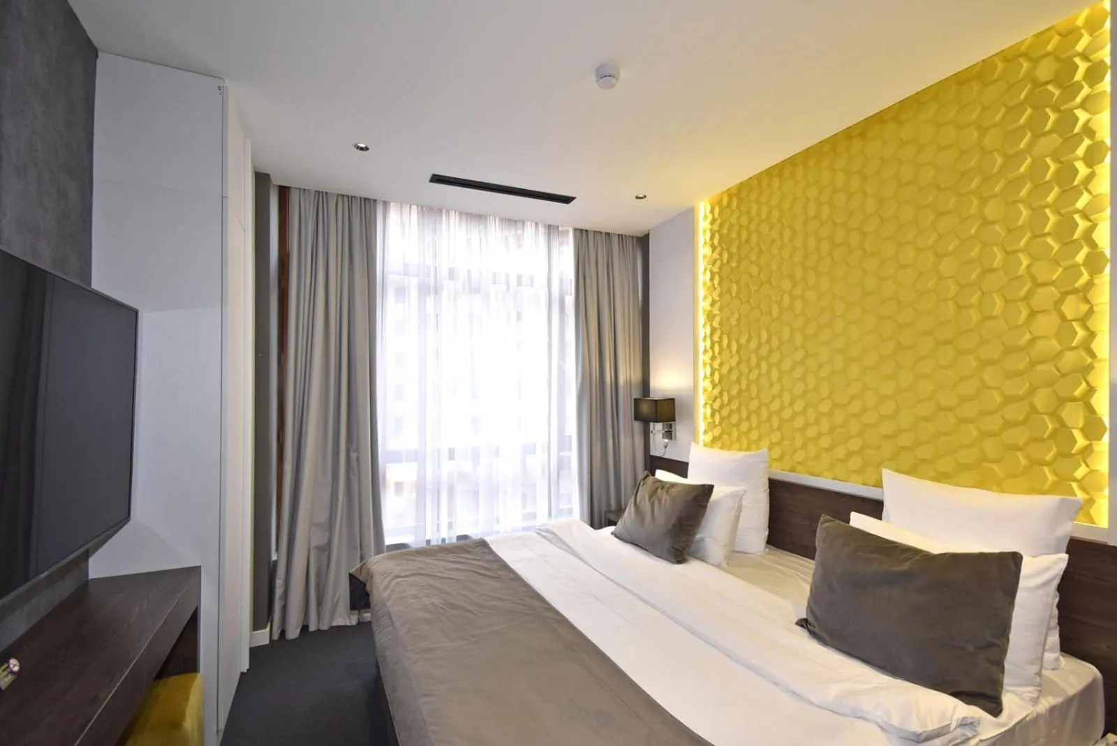 Bed in Avenue ApartHotel