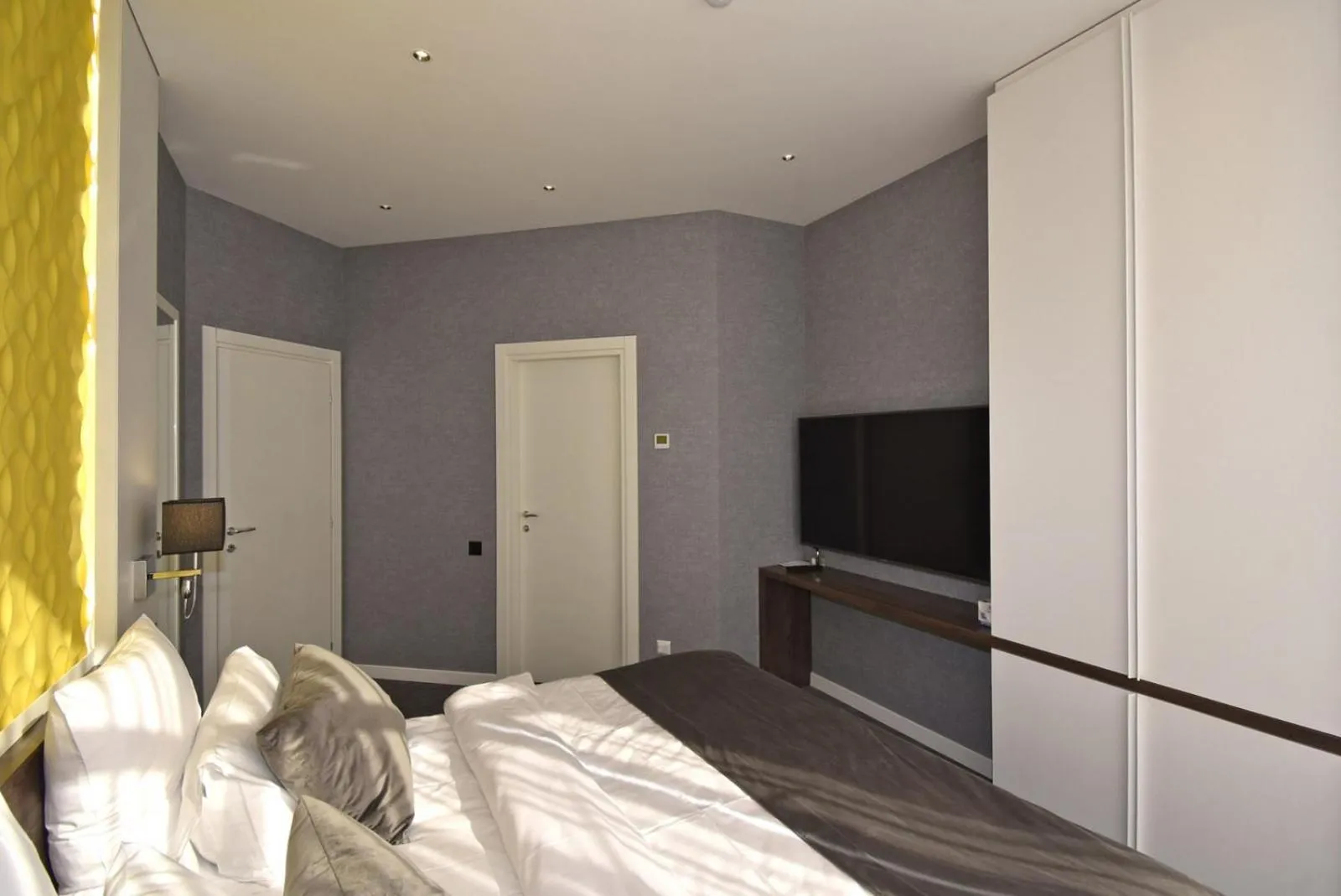 Bed in Avenue ApartHotel