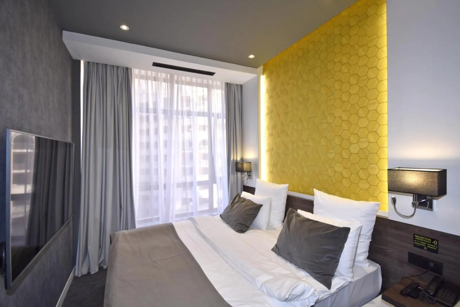 Bed in Avenue ApartHotel