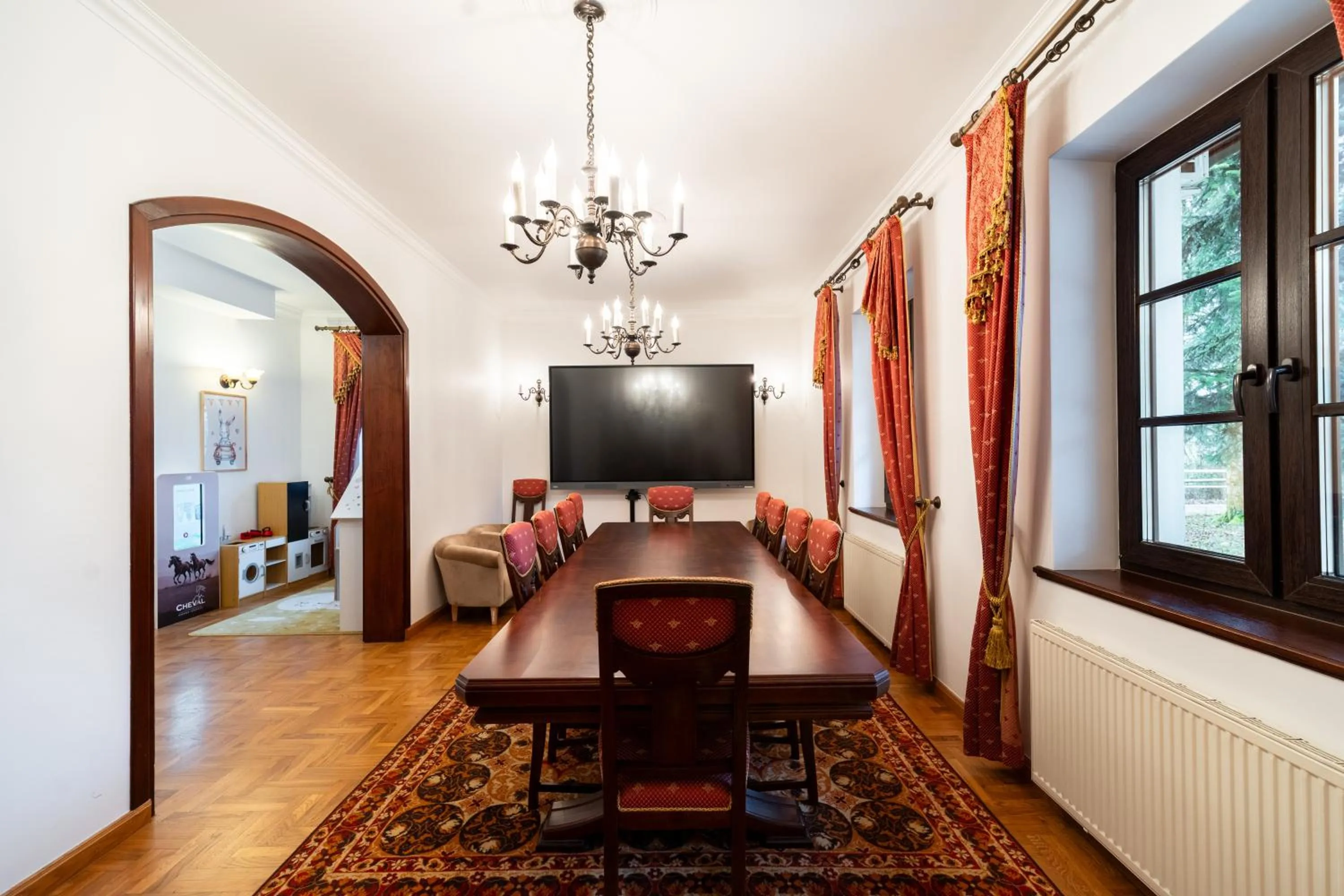 Communal lounge/ TV room in Apartamenty w Dworku Cheval