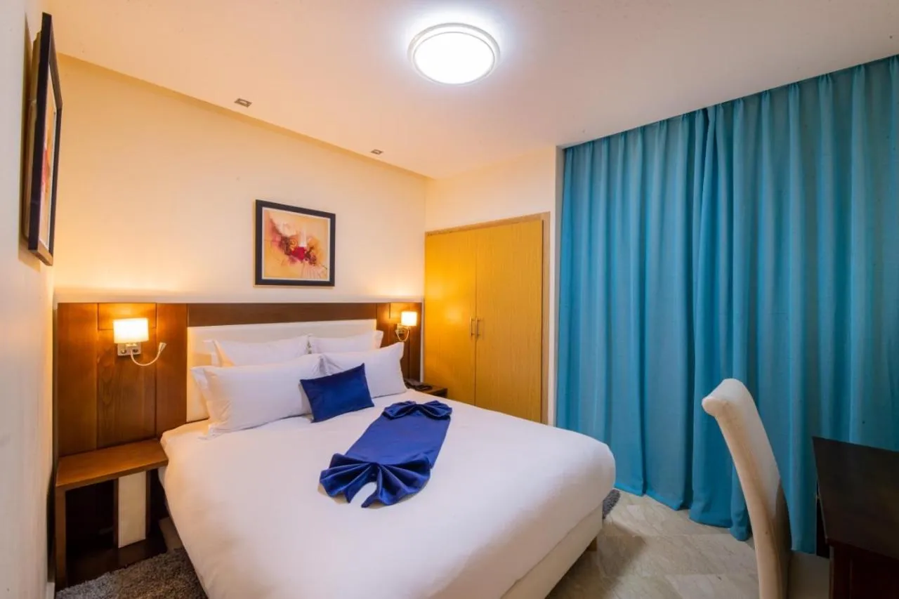 Bed in Appart-hotel Marrakech Inn