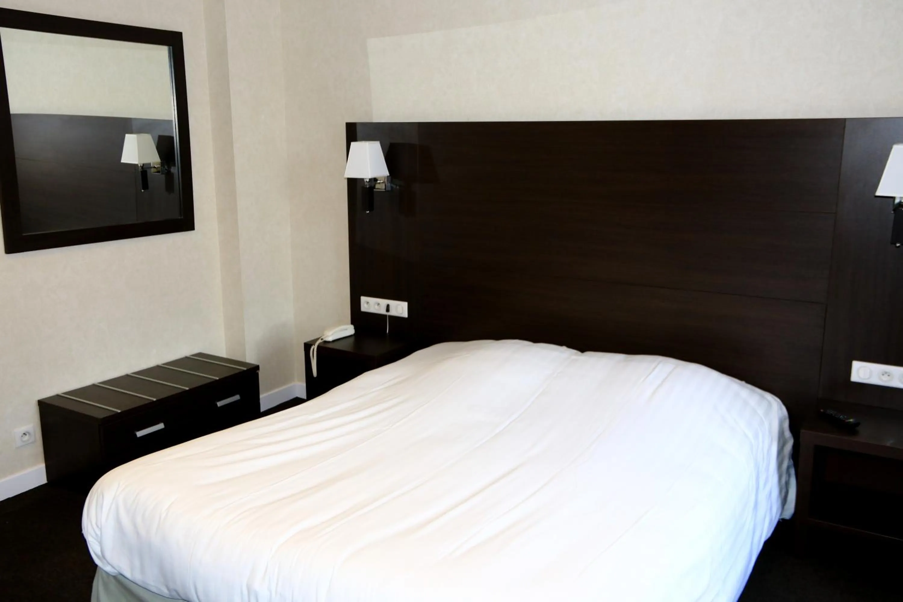 Bed in Hotel de la Basilique