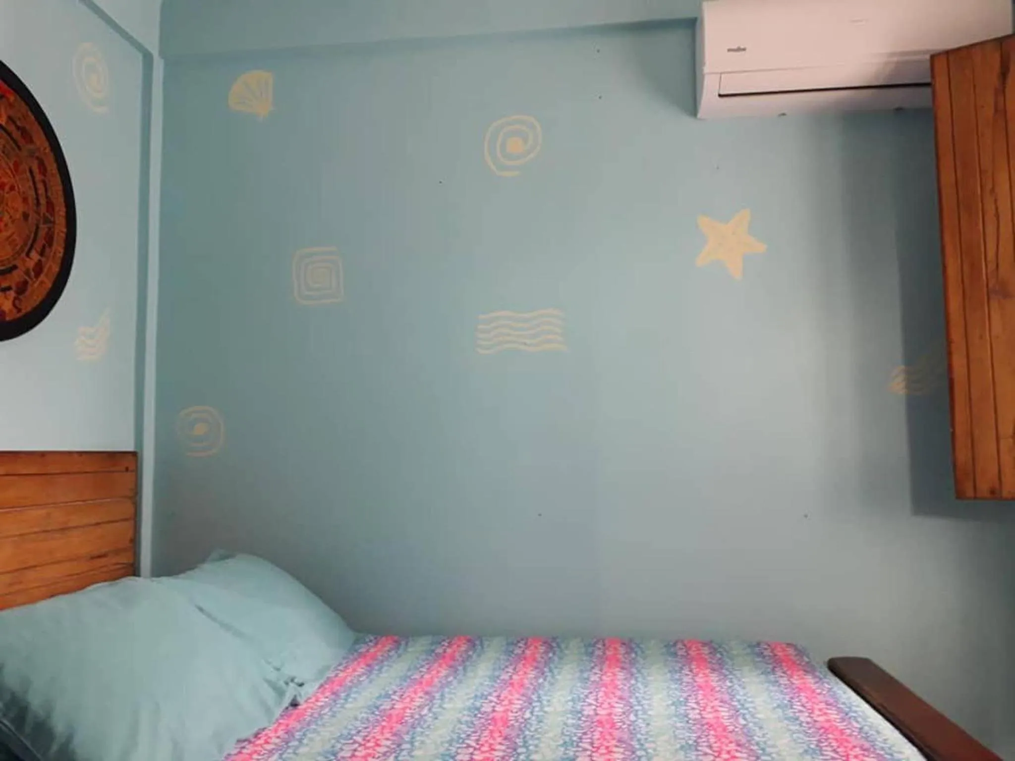 Bed in Cancun Guest House 5