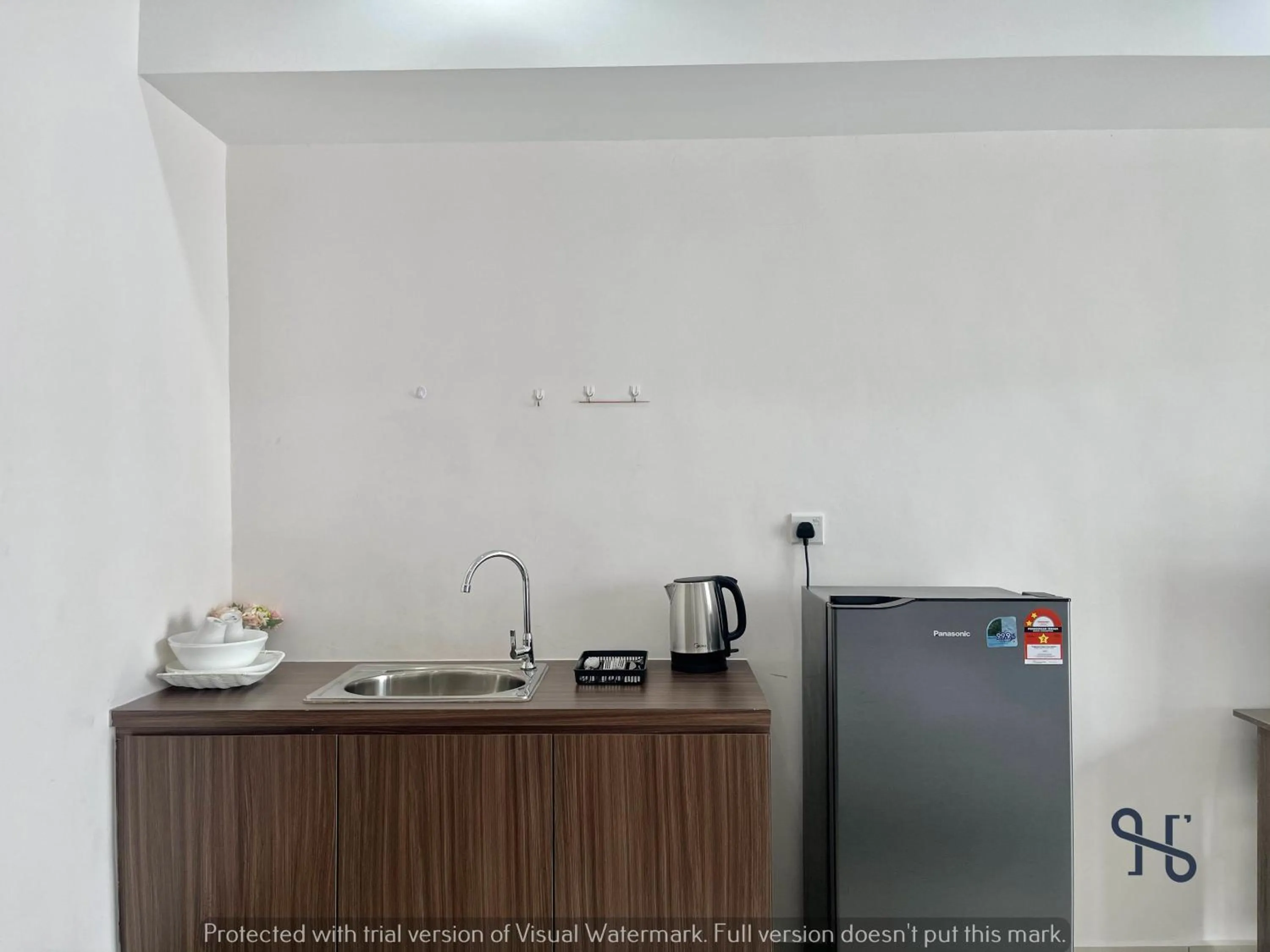 Kitchen or kitchenette in Homesuite' Home at Aeropod SOVO