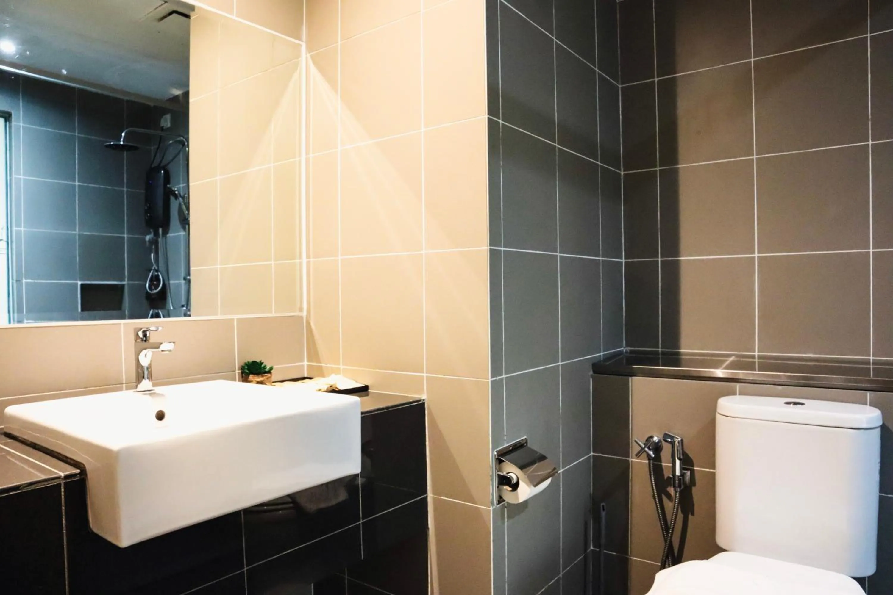 Bathroom in Homesuite' Home at Aeropod SOVO