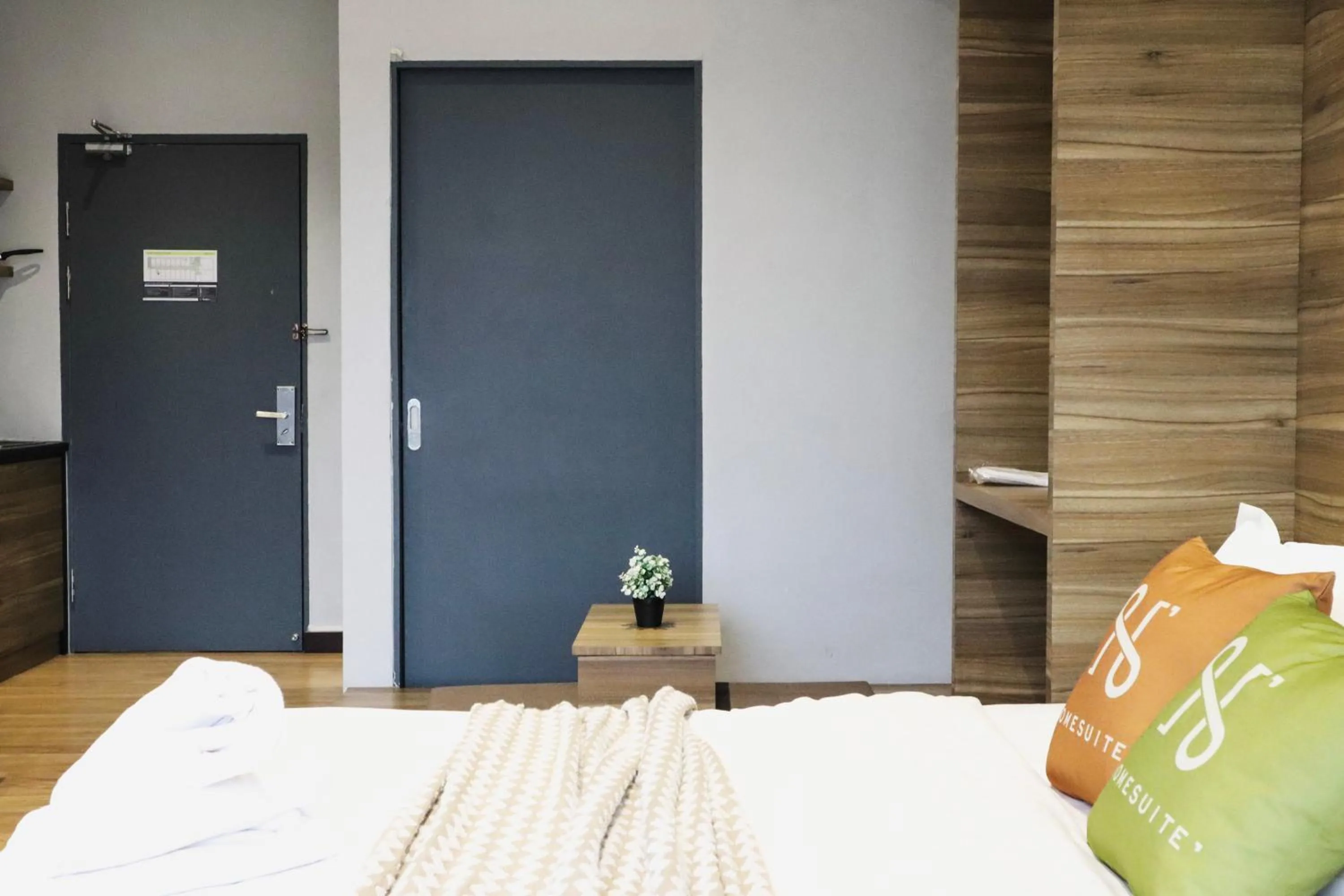 Bed in Homesuite' Home at Aeropod SOVO