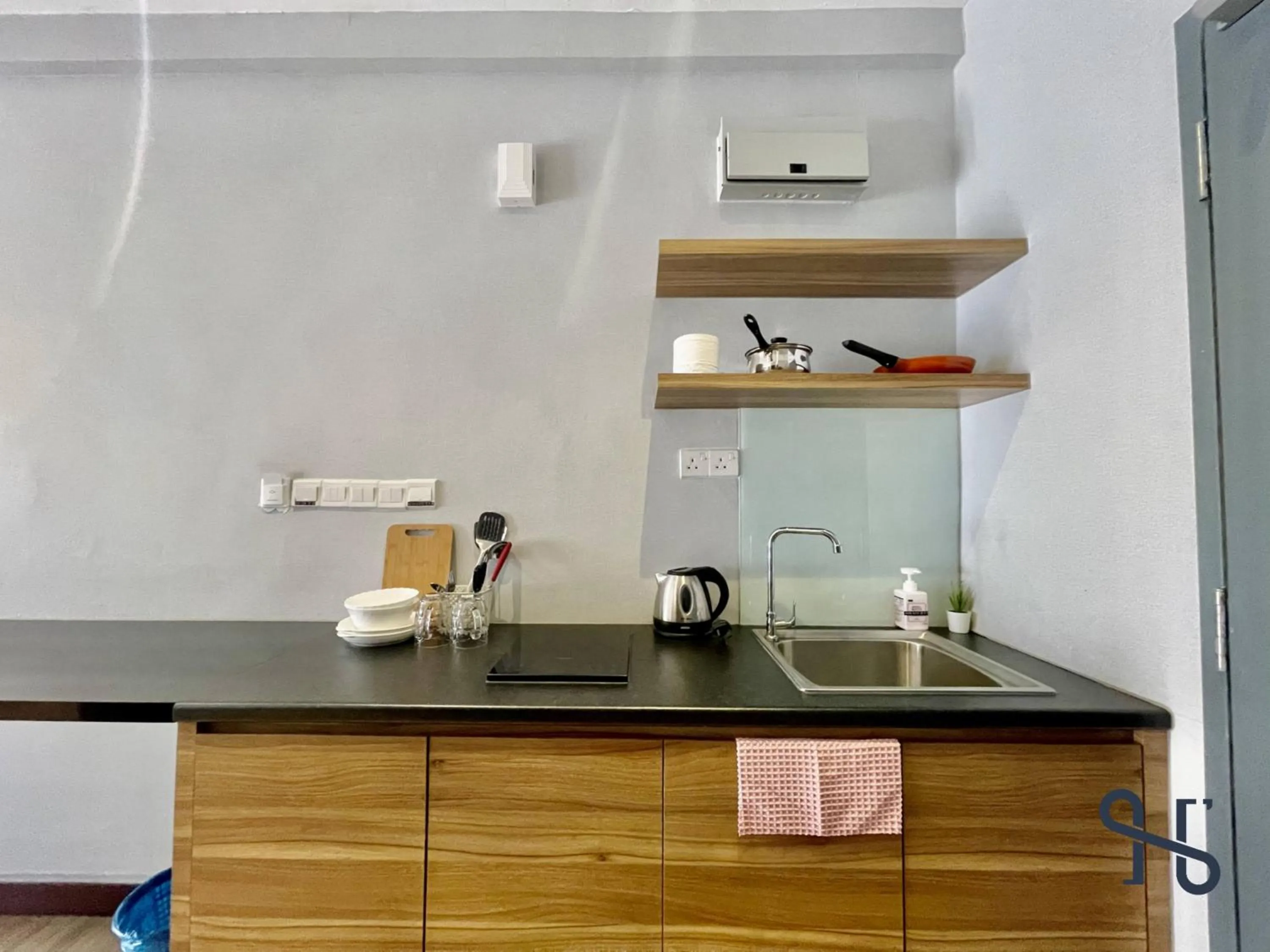 Kitchen or kitchenette in Homesuite' Home at Aeropod SOVO