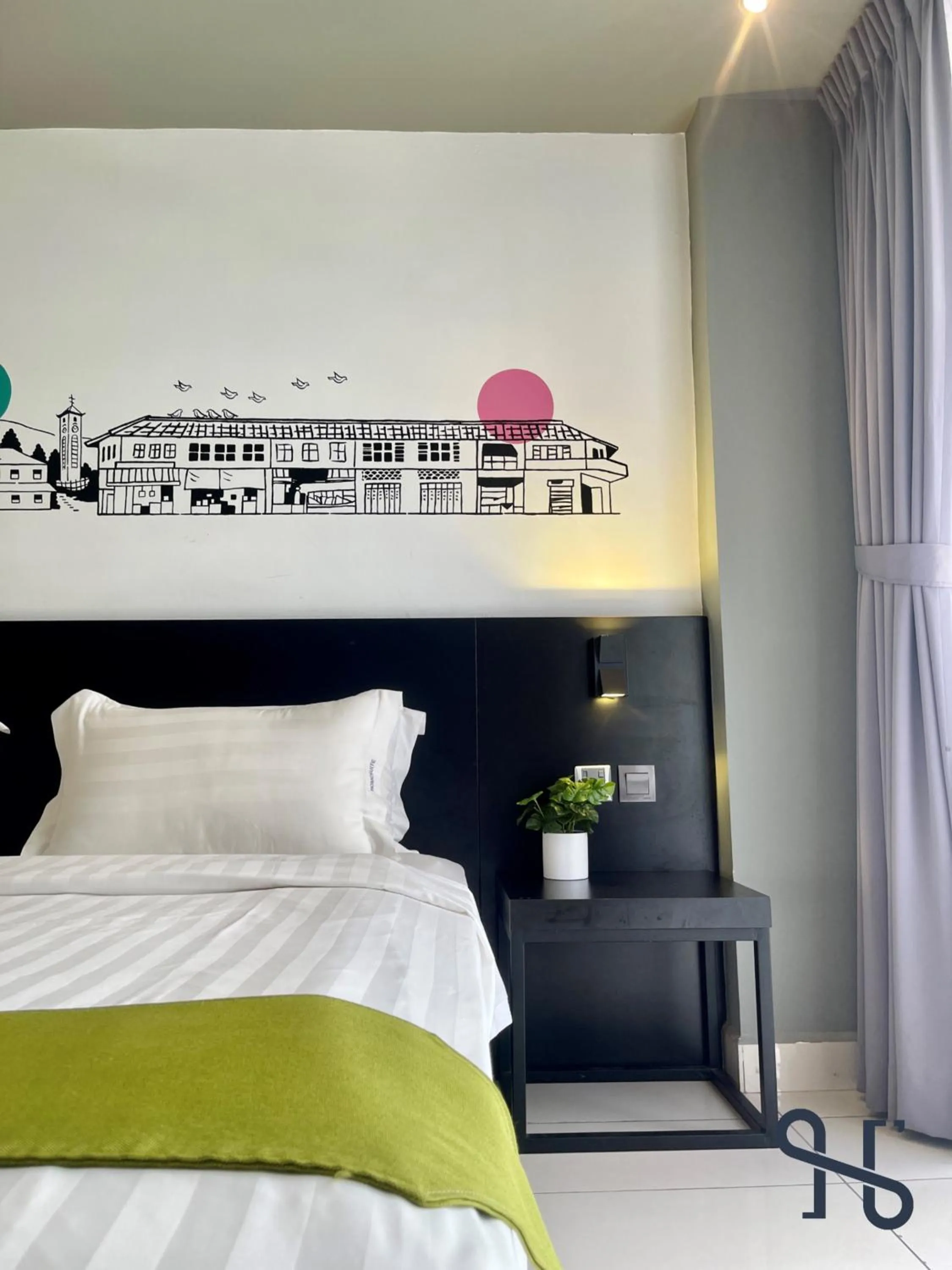 Bed in Homesuite' Home at Aeropod SOVO