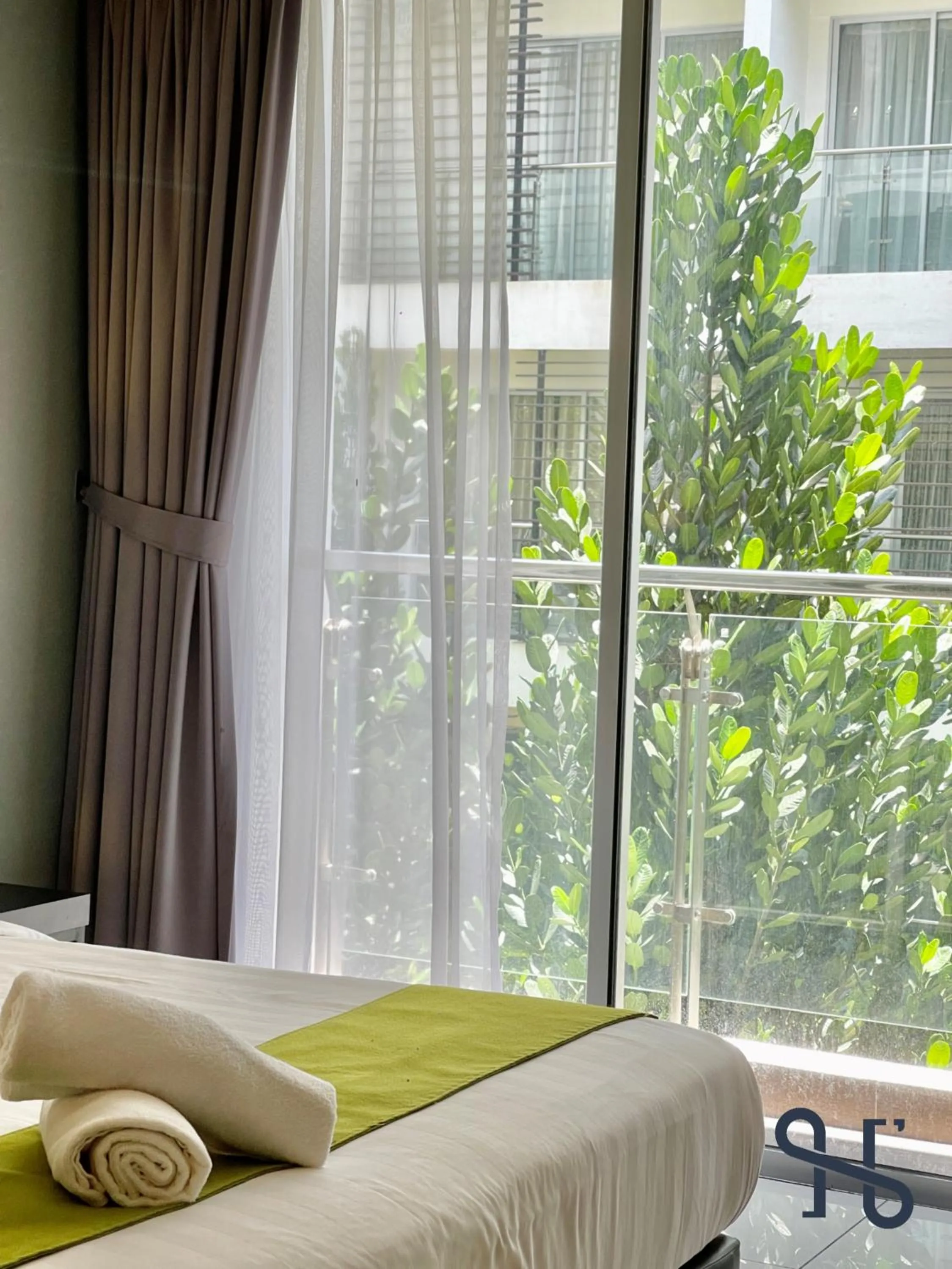 Bed in Homesuite' Home at Aeropod SOVO