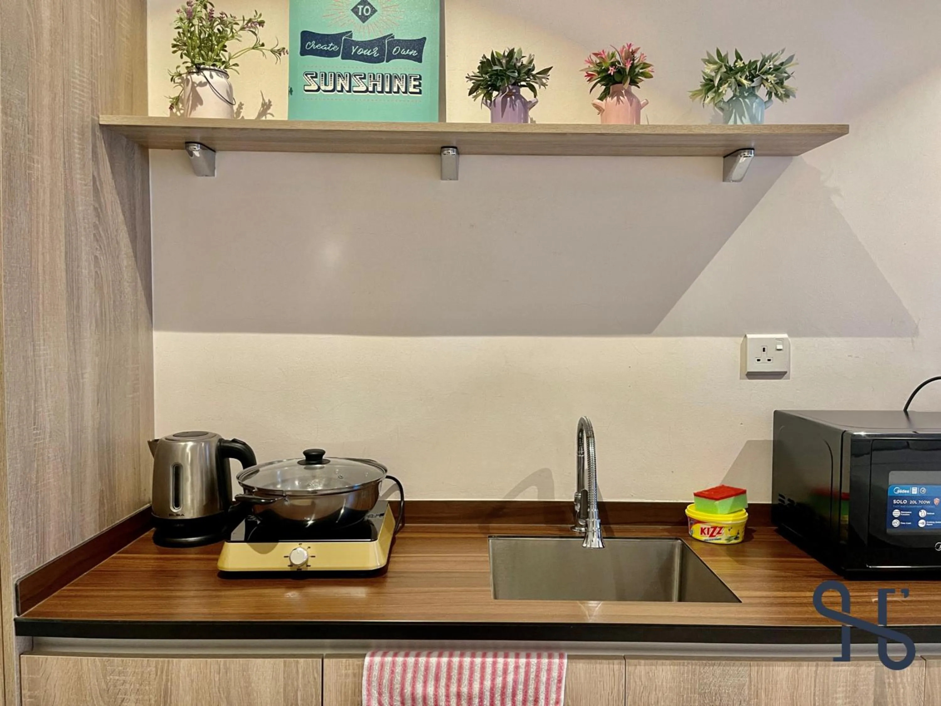 Kitchen or kitchenette in Homesuite' Home at Aeropod SOVO