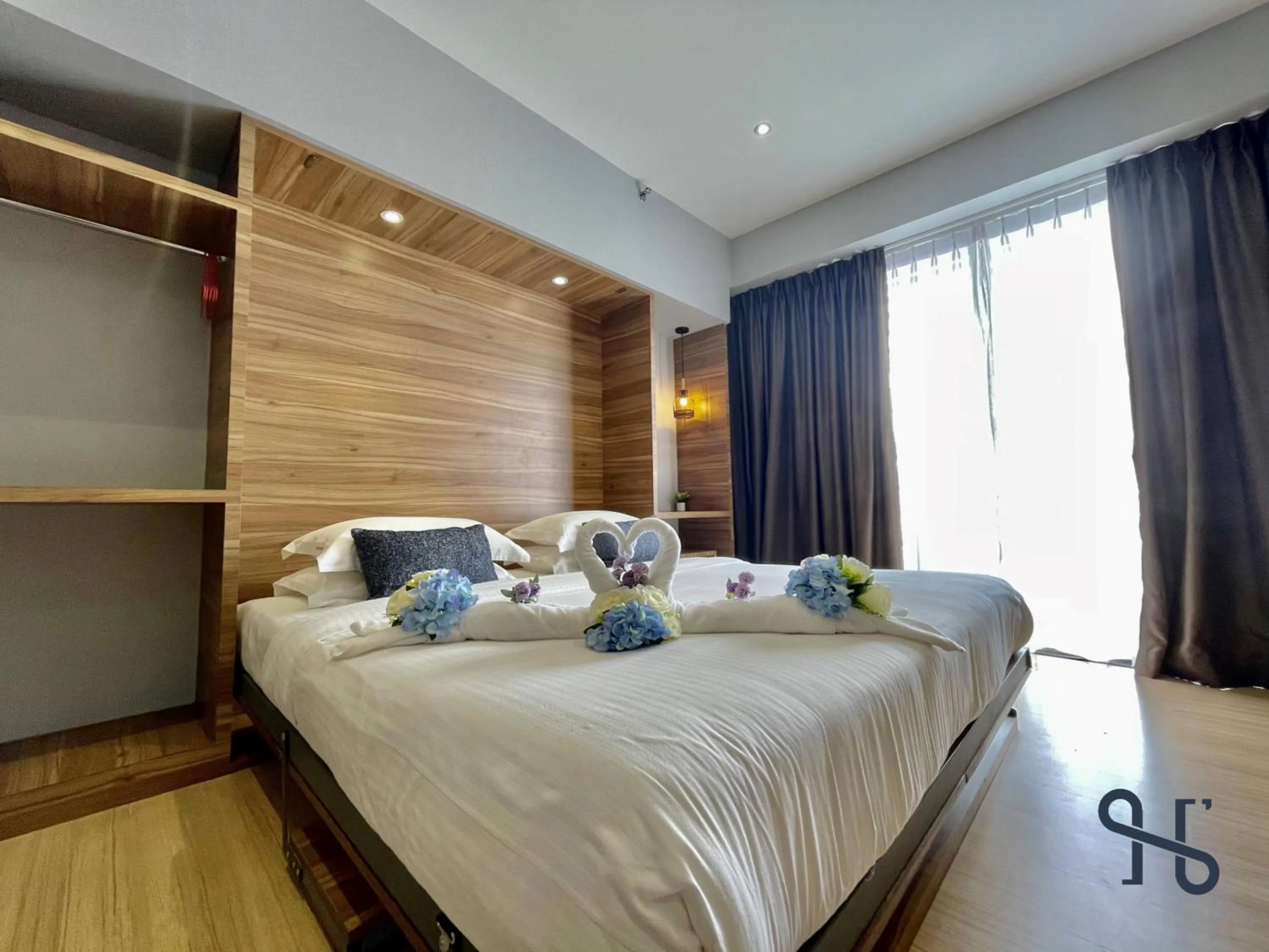 Bed in Homesuite' Home at Aeropod SOVO