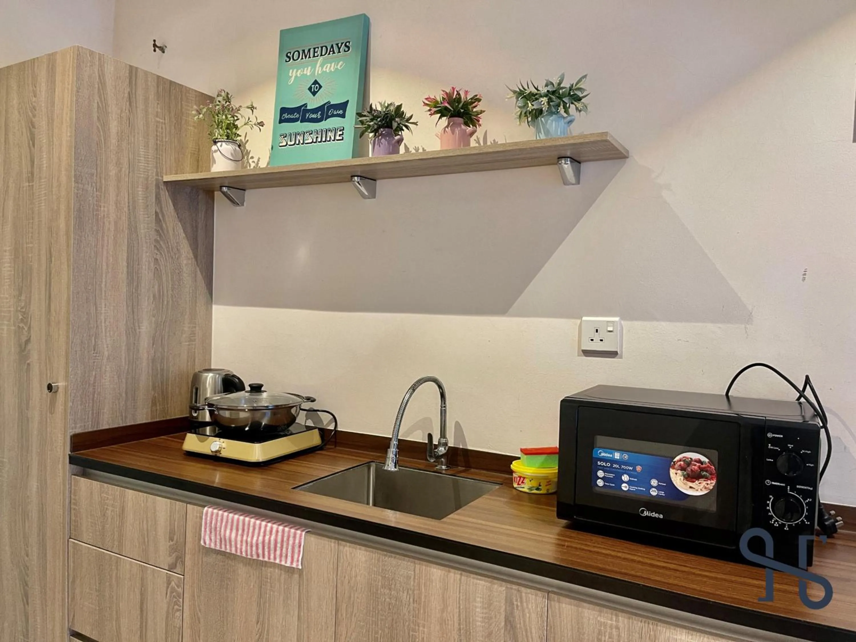 Kitchen or kitchenette in Homesuite' Home at Aeropod SOVO