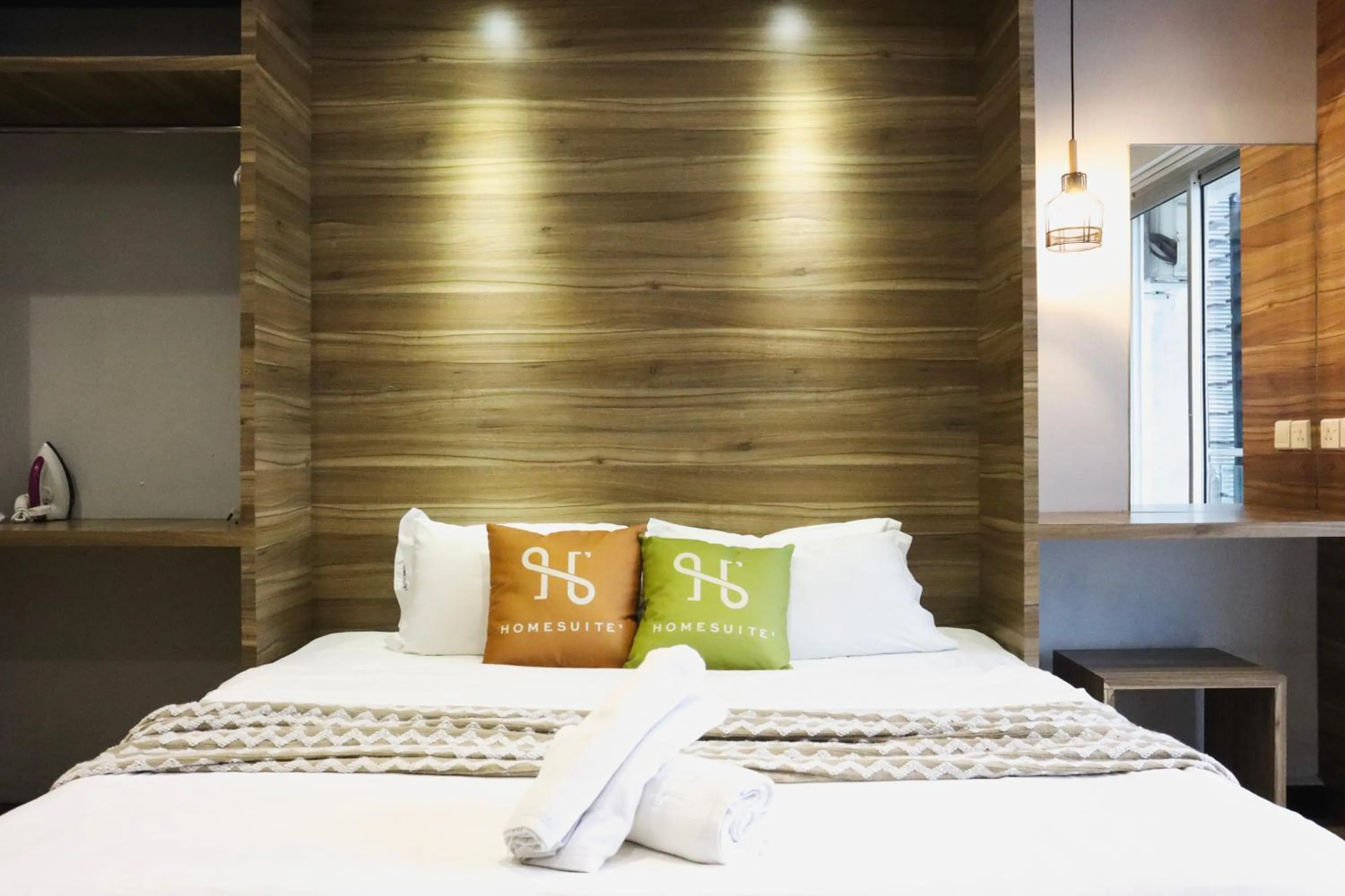 Photo of the whole room, Bed in Homesuite' Home at Aeropod SOVO