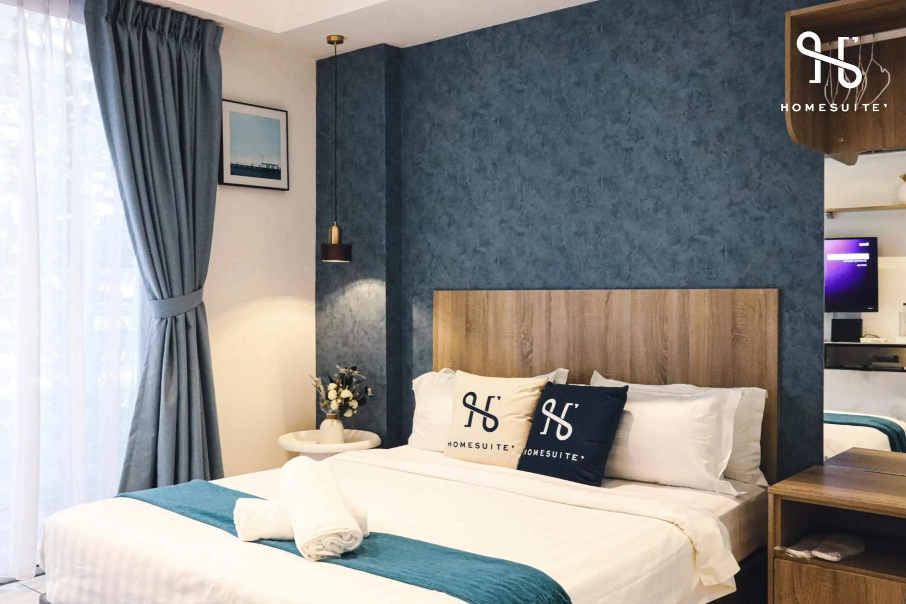 Photo of the whole room, Bed in Homesuite' Home at Aeropod SOVO