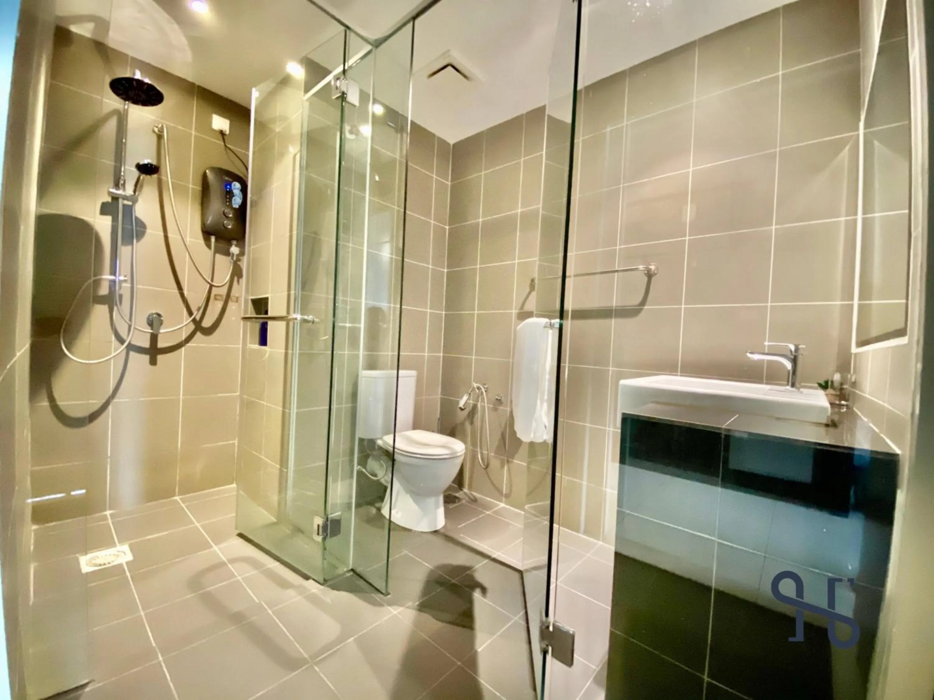 Toilet in Homesuite' Home at Aeropod SOVO