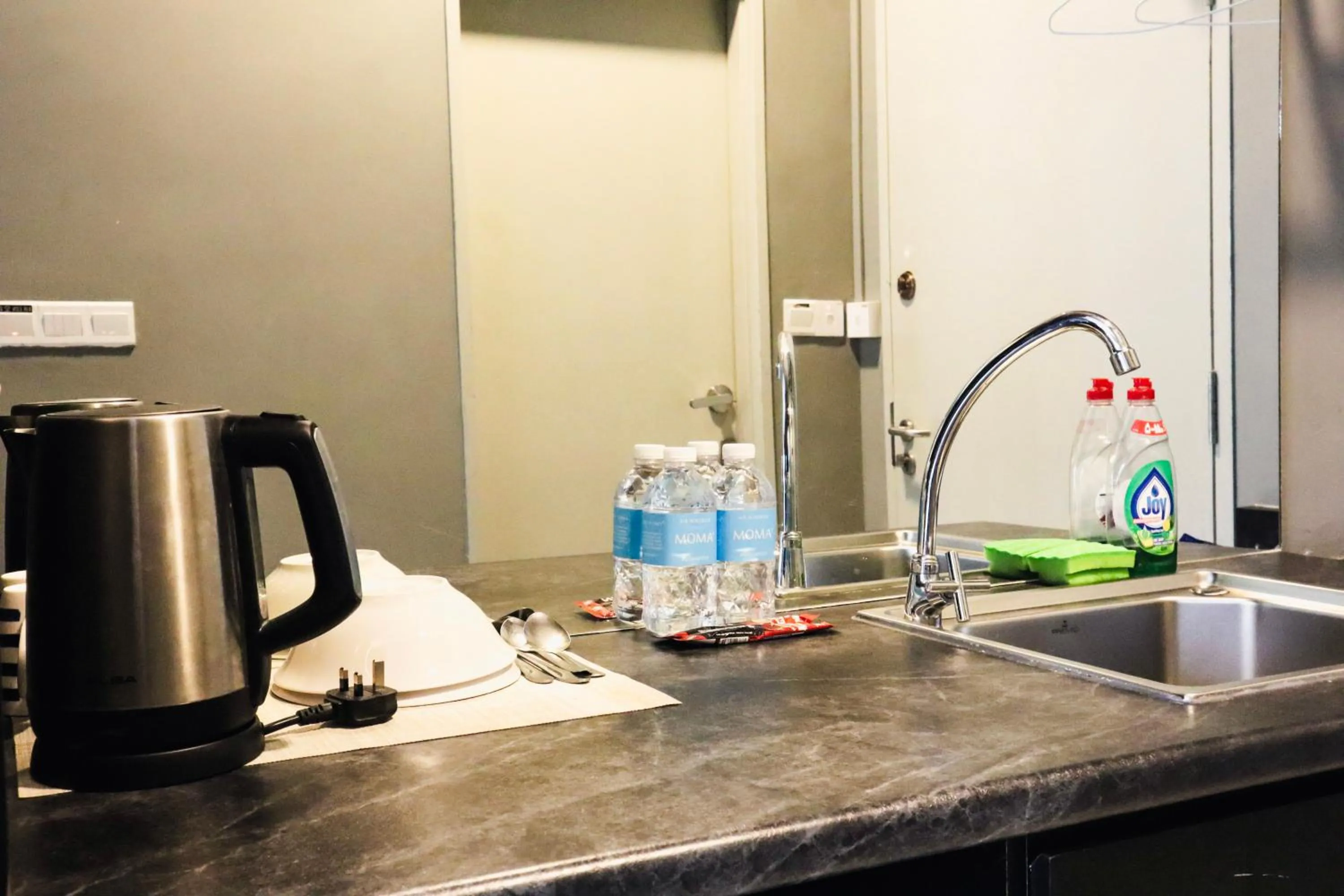 Kitchen or kitchenette in Homesuite' Home at Aeropod SOVO