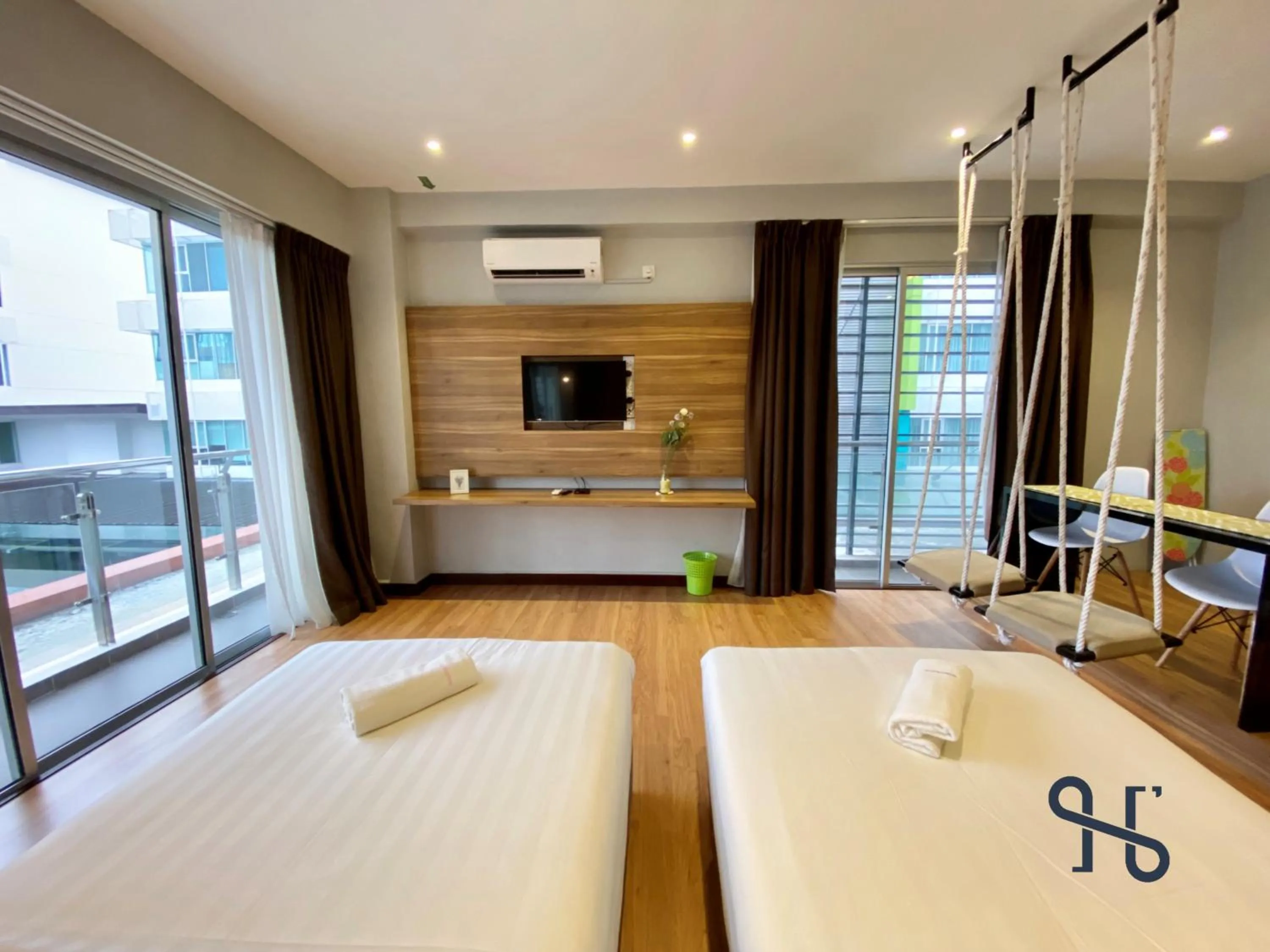 Bed in Homesuite' Home at Aeropod SOVO