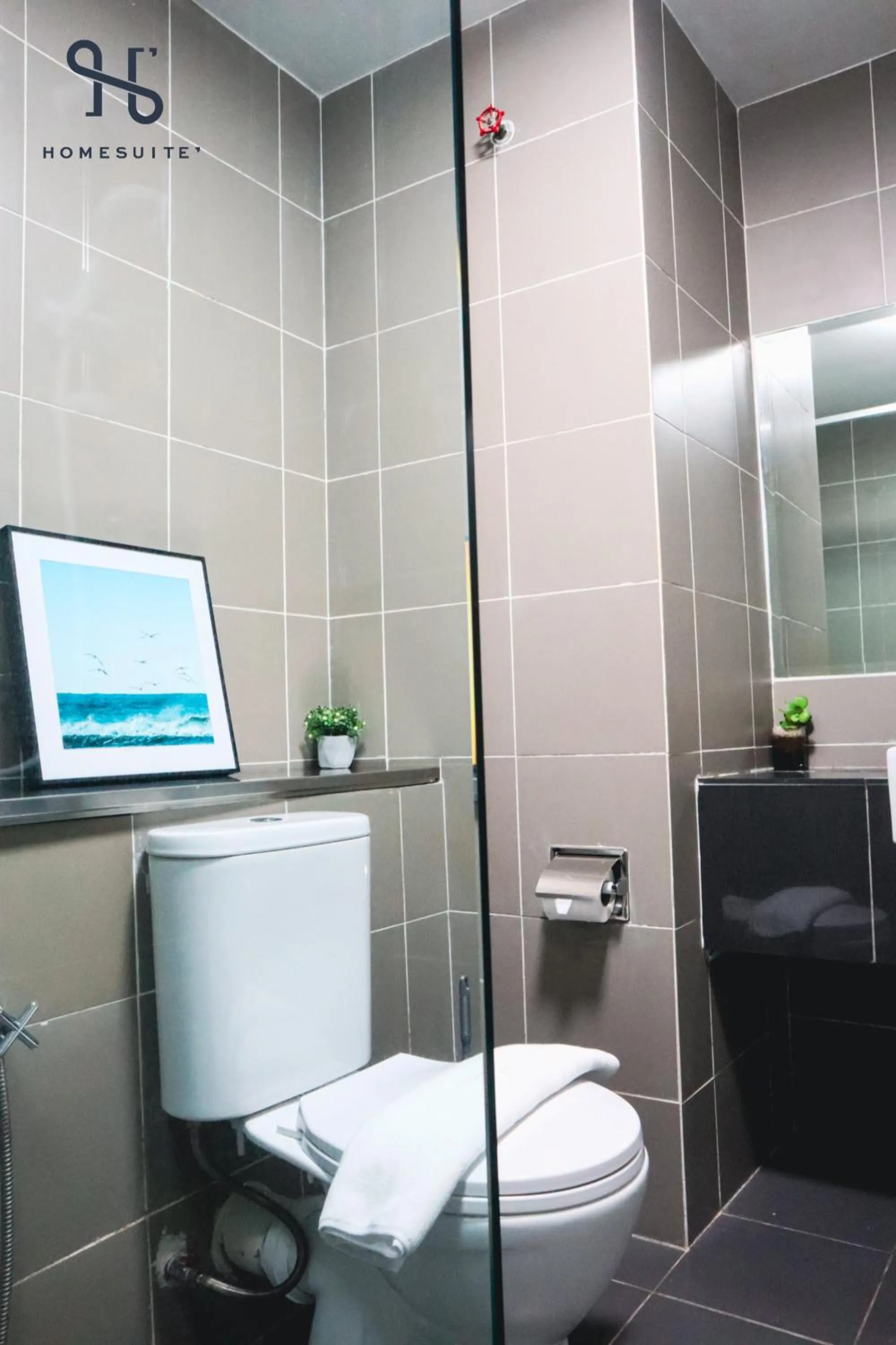 Toilet in Homesuite' Home at Aeropod SOVO