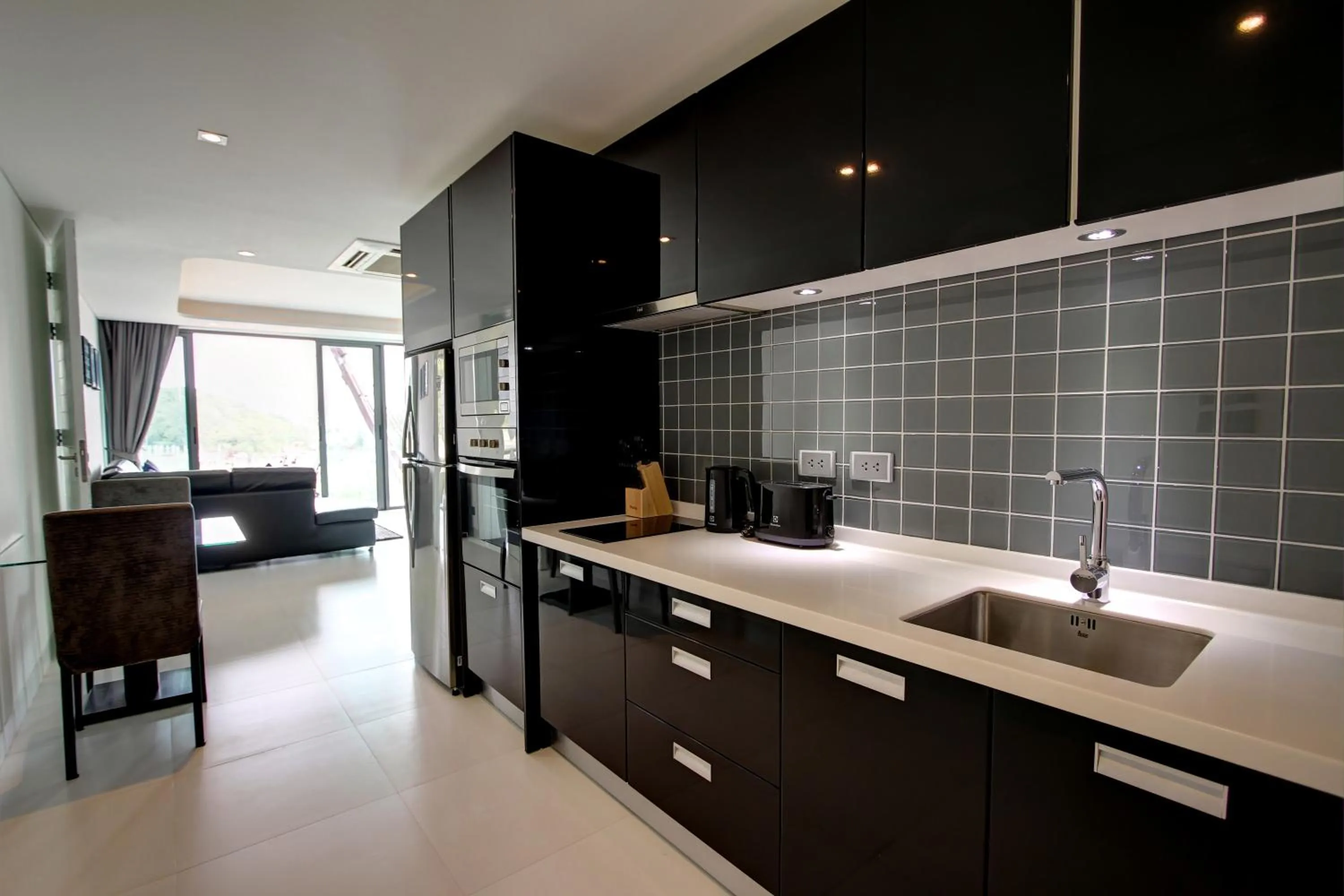 Kitchen or kitchenette in Lets Phuket Twin Sands Resort & Spa