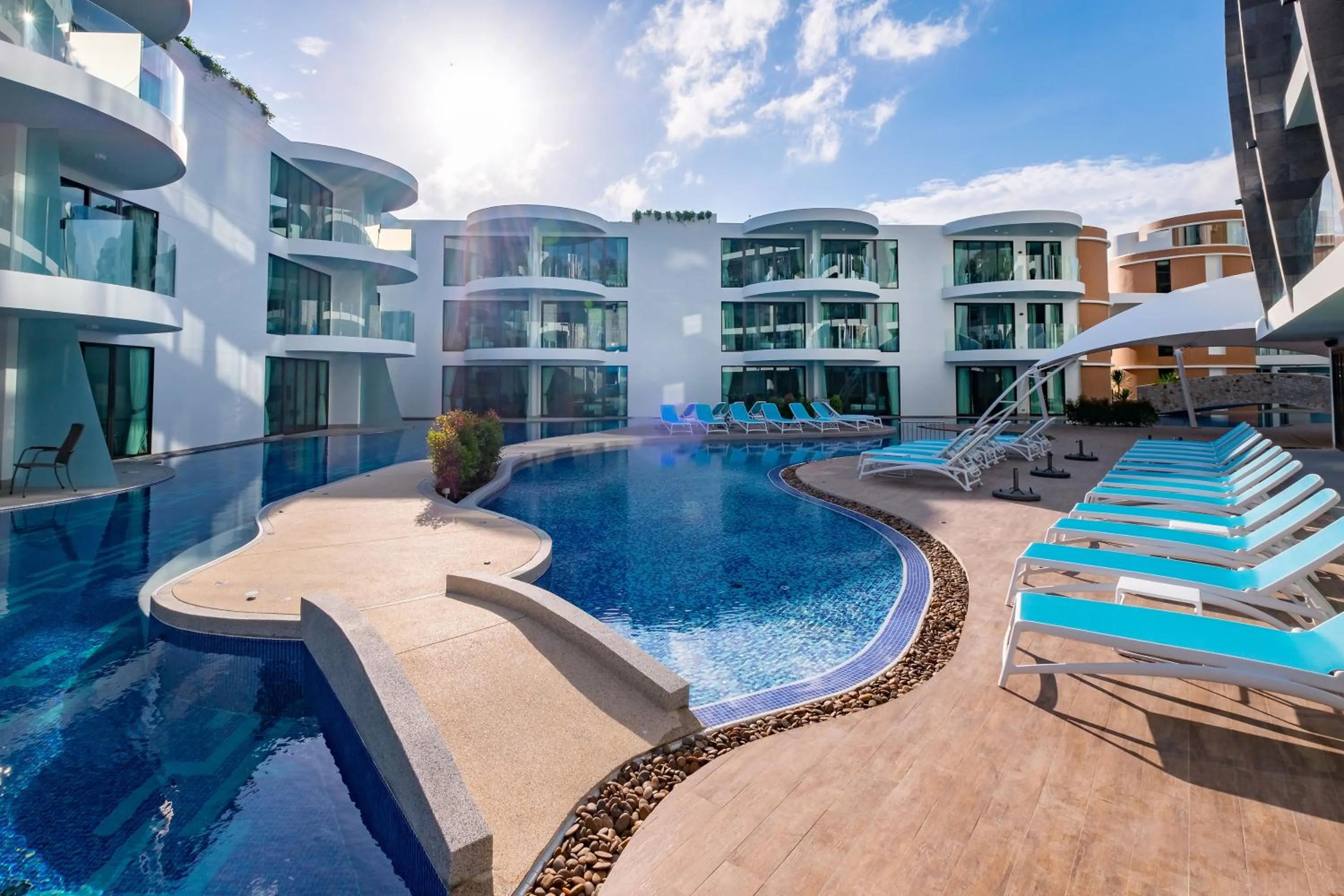 Swimming pool in Lets Phuket Twin Sands Resort & Spa