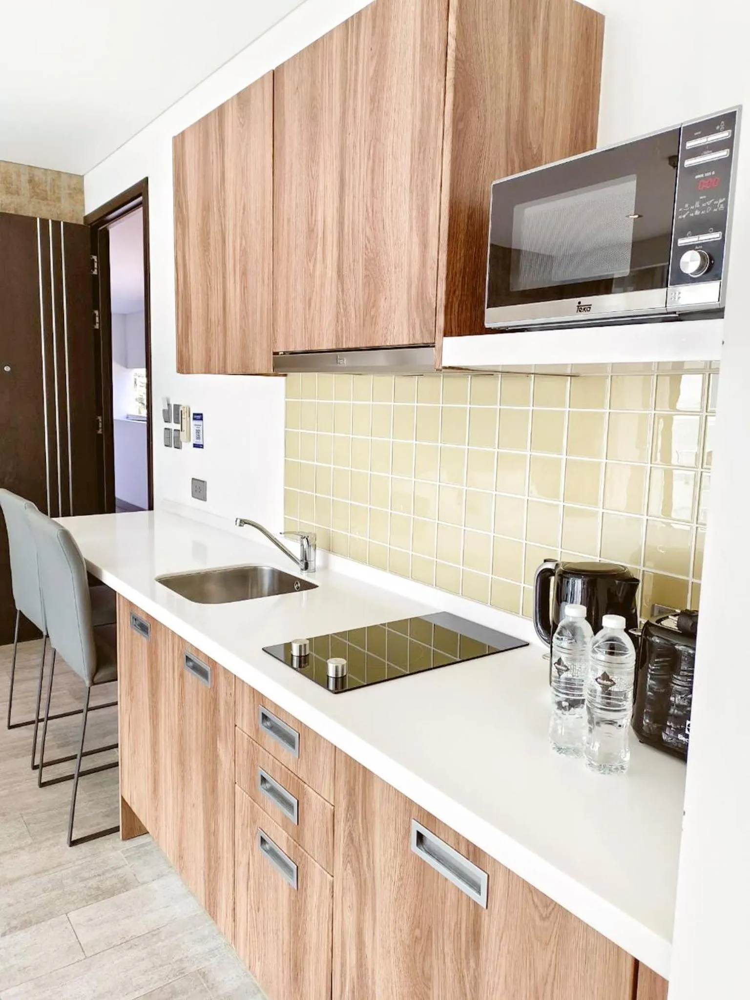 Kitchen or kitchenette in Lets Phuket Twin Sands Resort & Spa