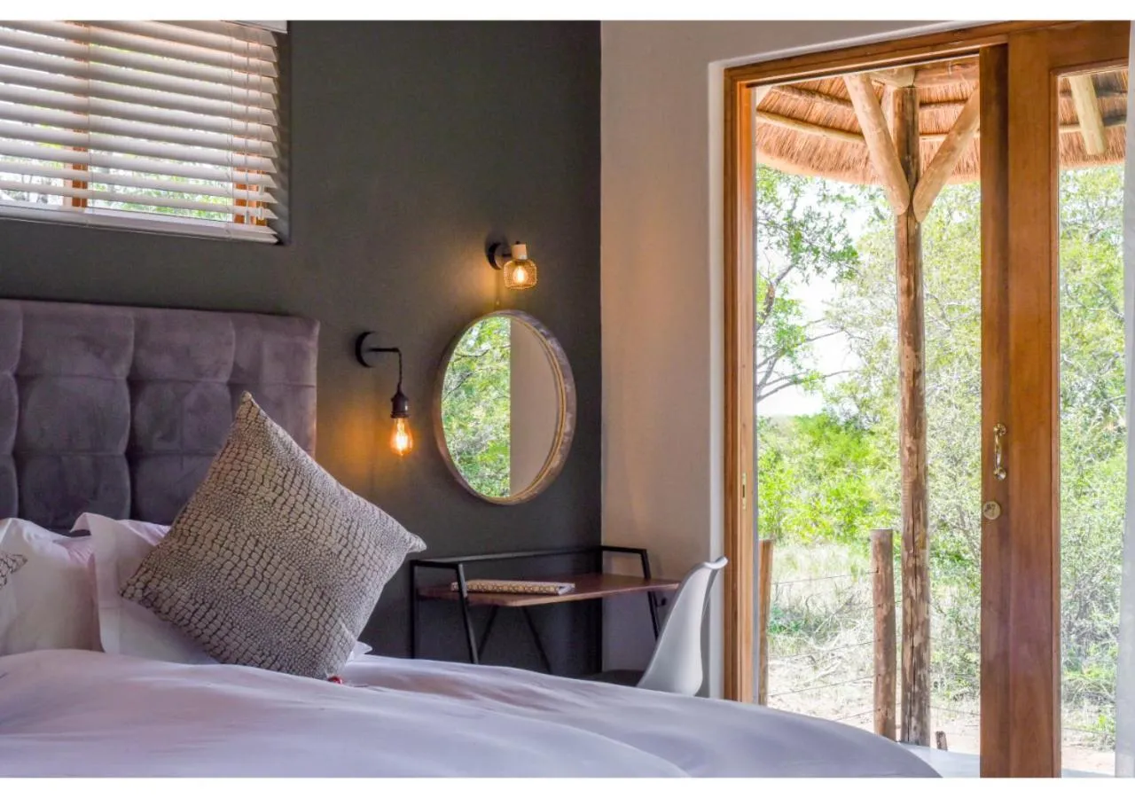 Bed in Mziki Safari Lodge