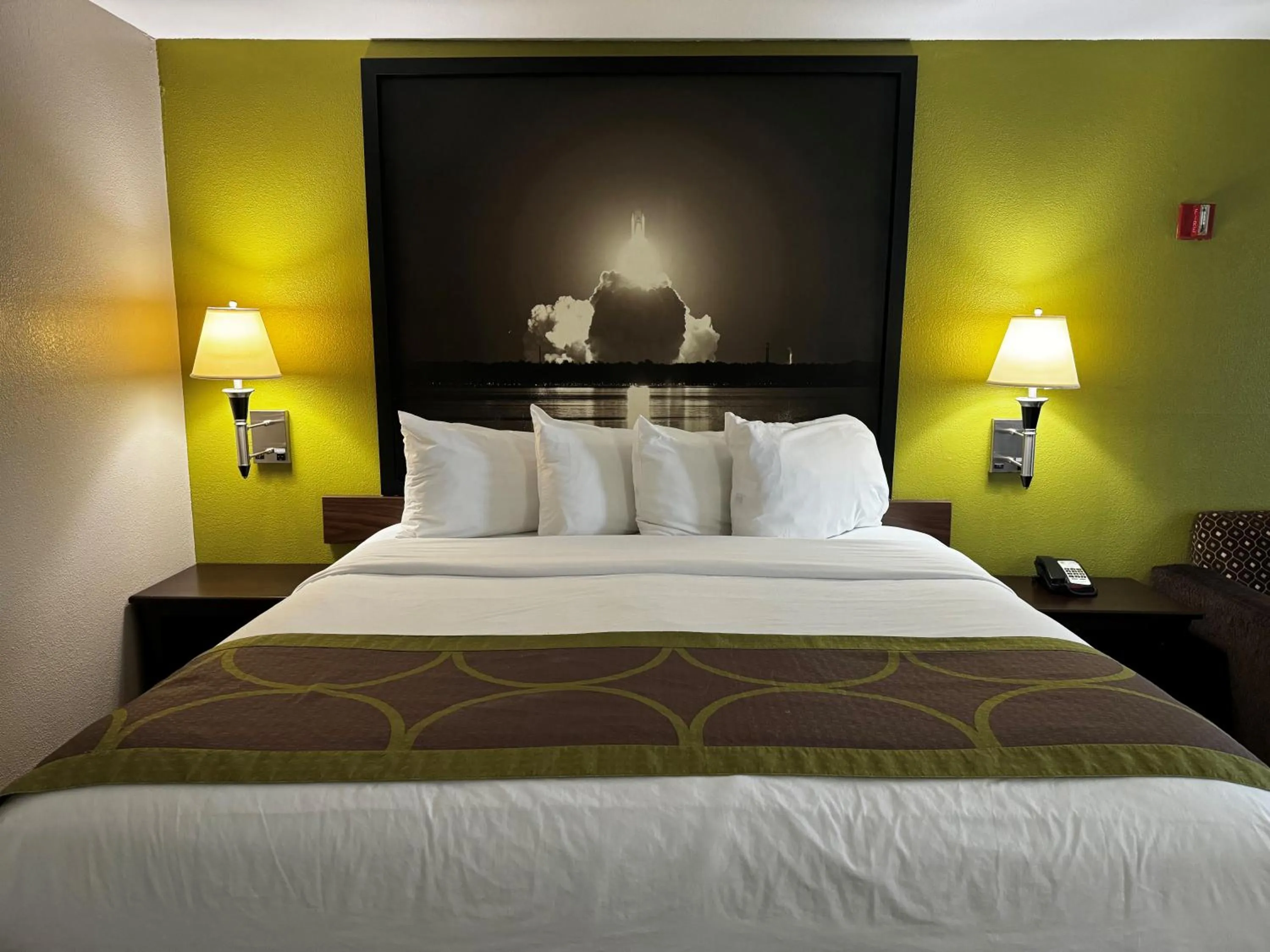 Bed in Super 8 by Wyndham Houston Webster NASA