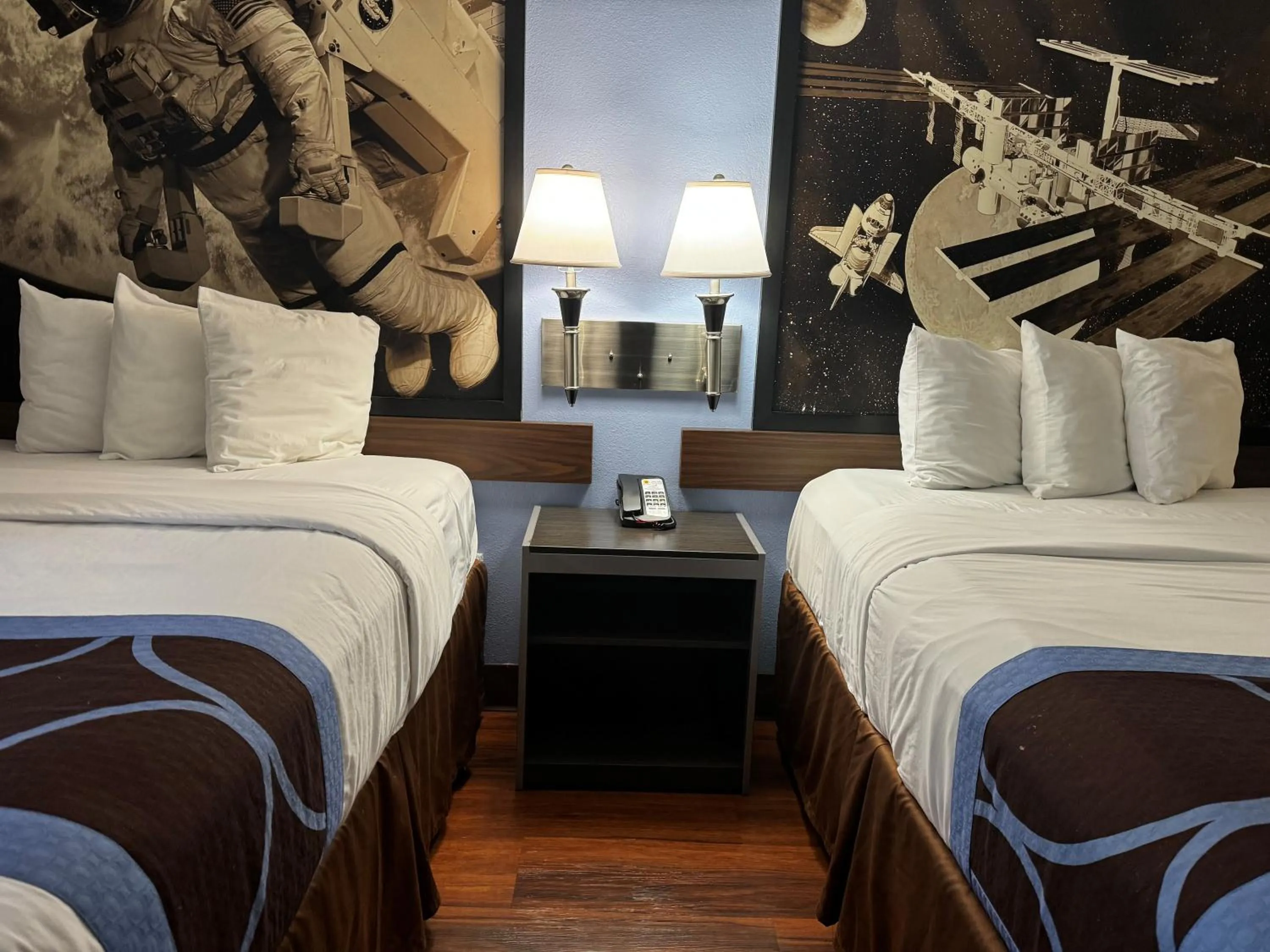 Bed in Super 8 by Wyndham Houston Webster NASA