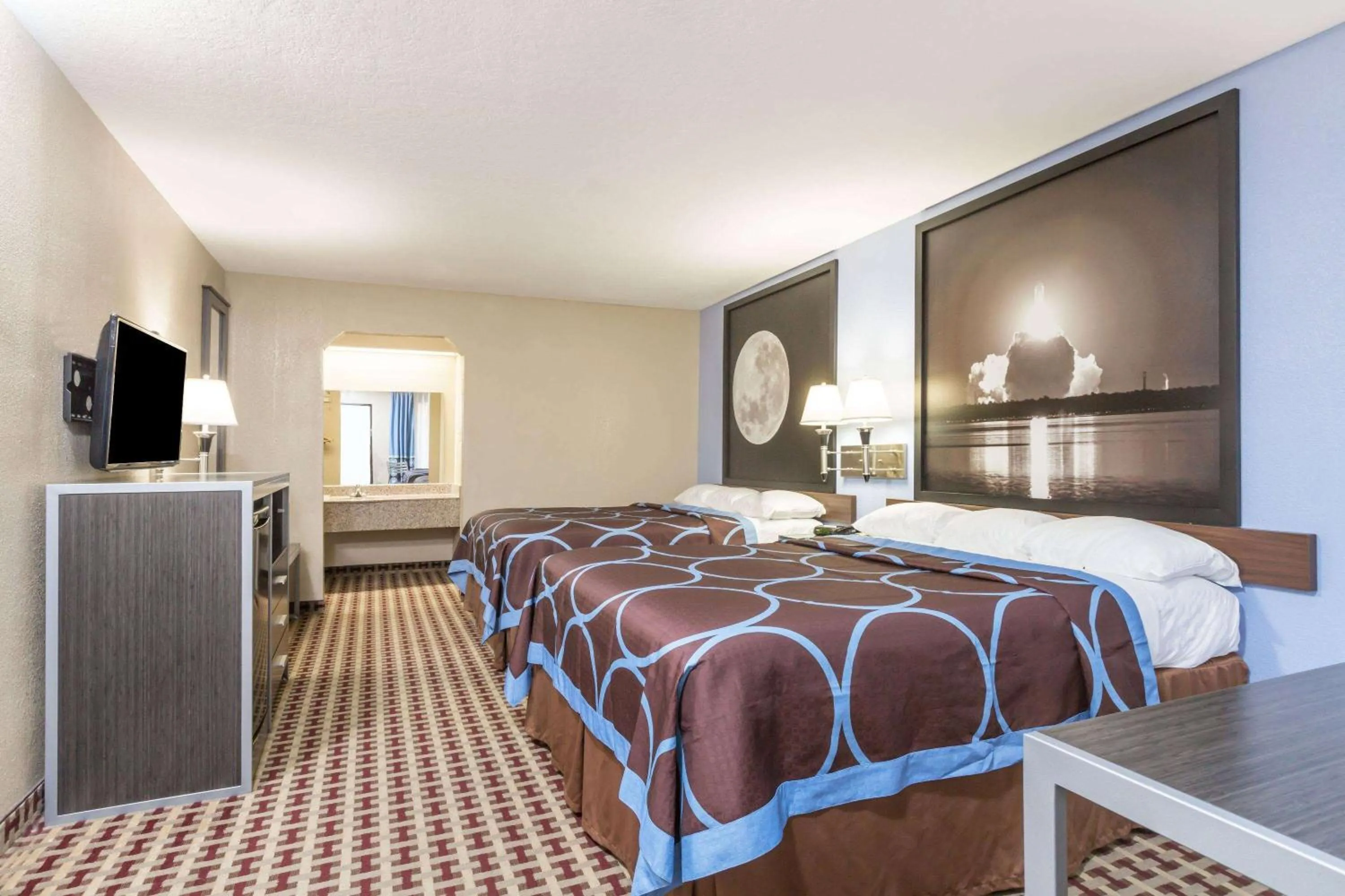 Photo of the whole room in Super 8 by Wyndham Houston Webster NASA