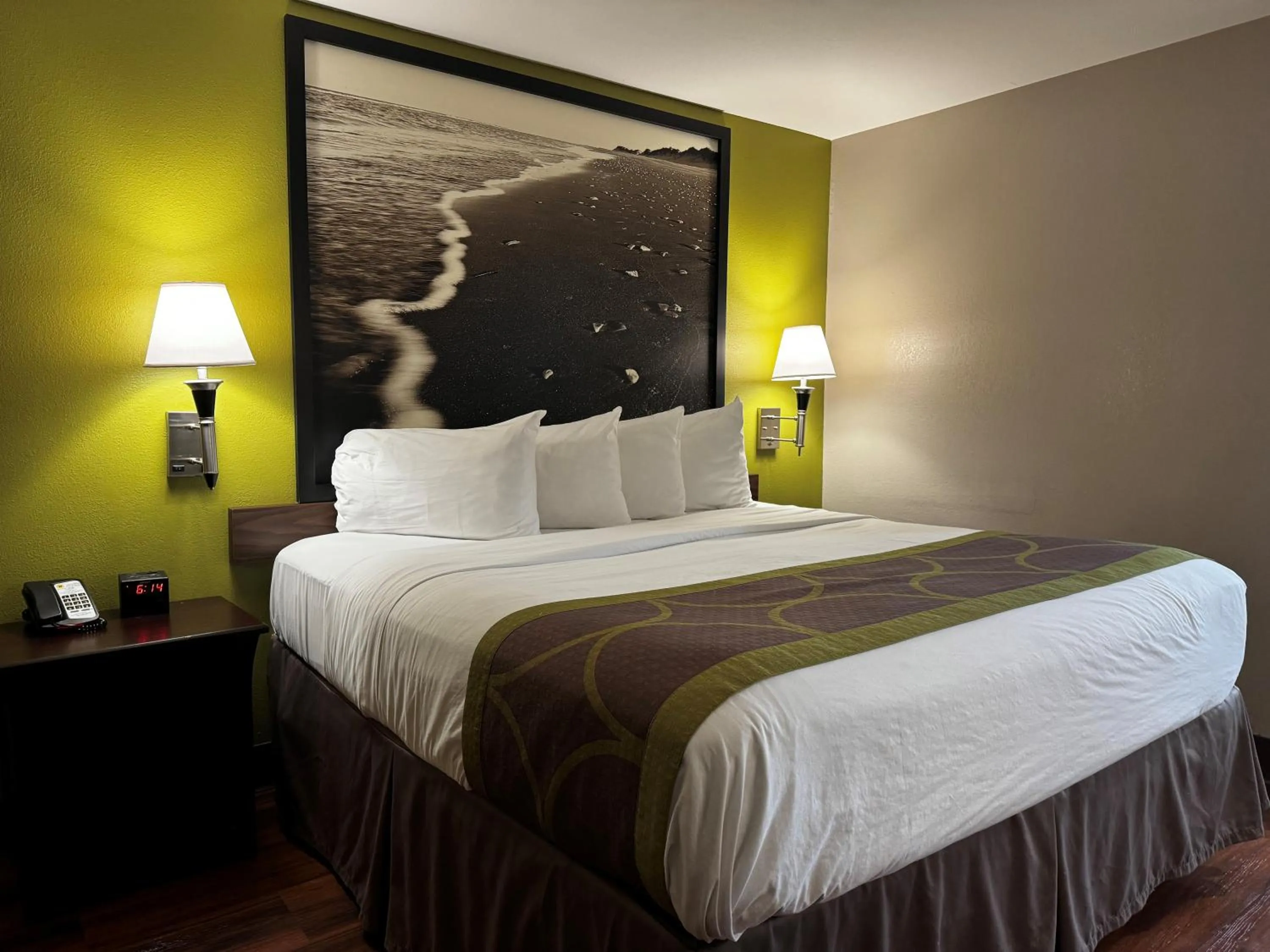 Bed in Super 8 by Wyndham Houston Webster NASA