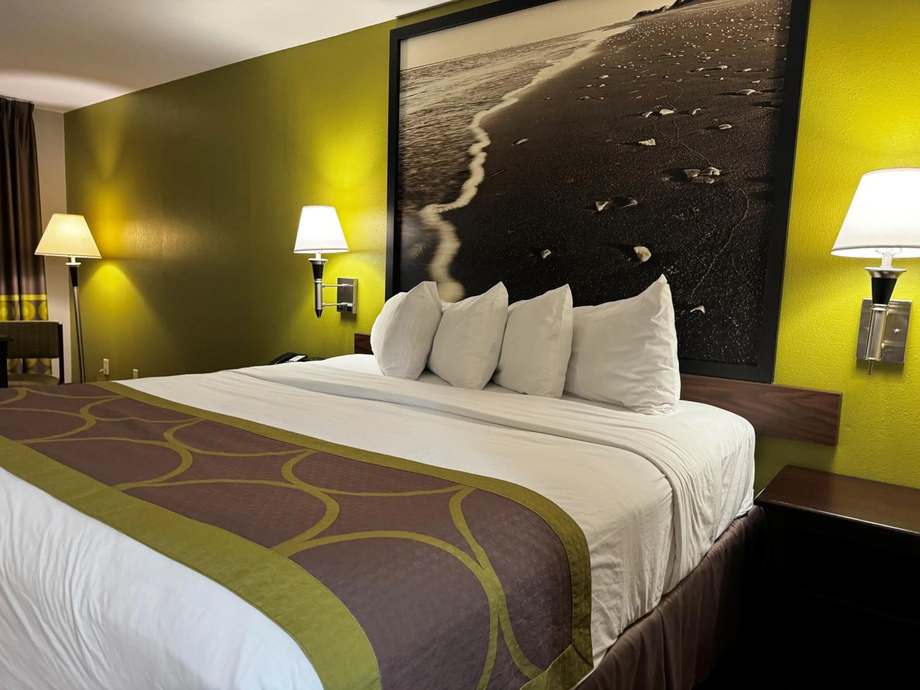 Bed in Super 8 by Wyndham Houston Webster NASA