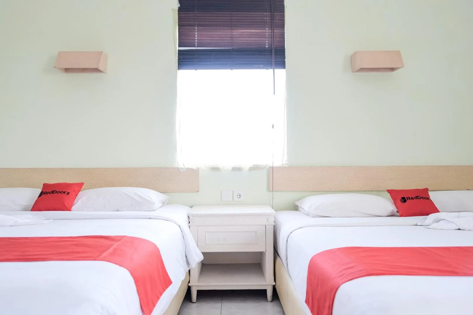 Bed in RedDoorz Plus at Sunrise Hotel Sanur