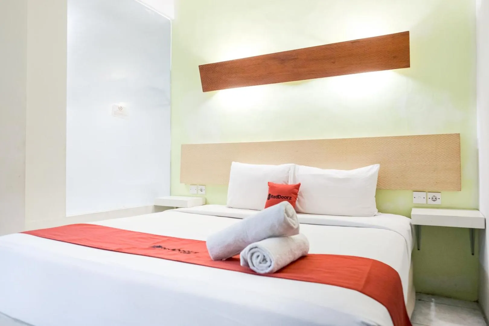 Bedroom, Bed in RedDoorz Plus at Sunrise Hotel Sanur