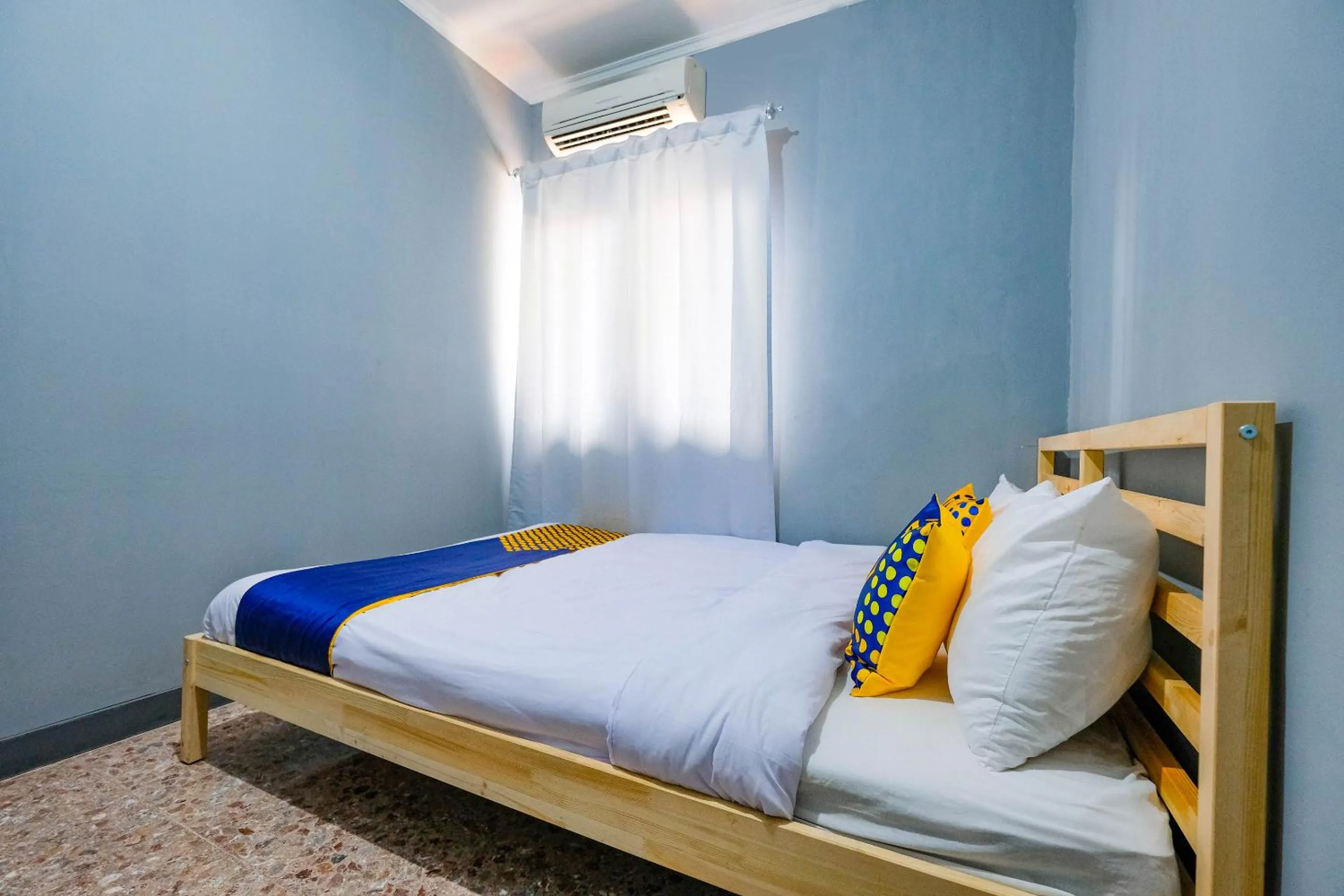 Bedroom in SPOT ON 2281 Omajo