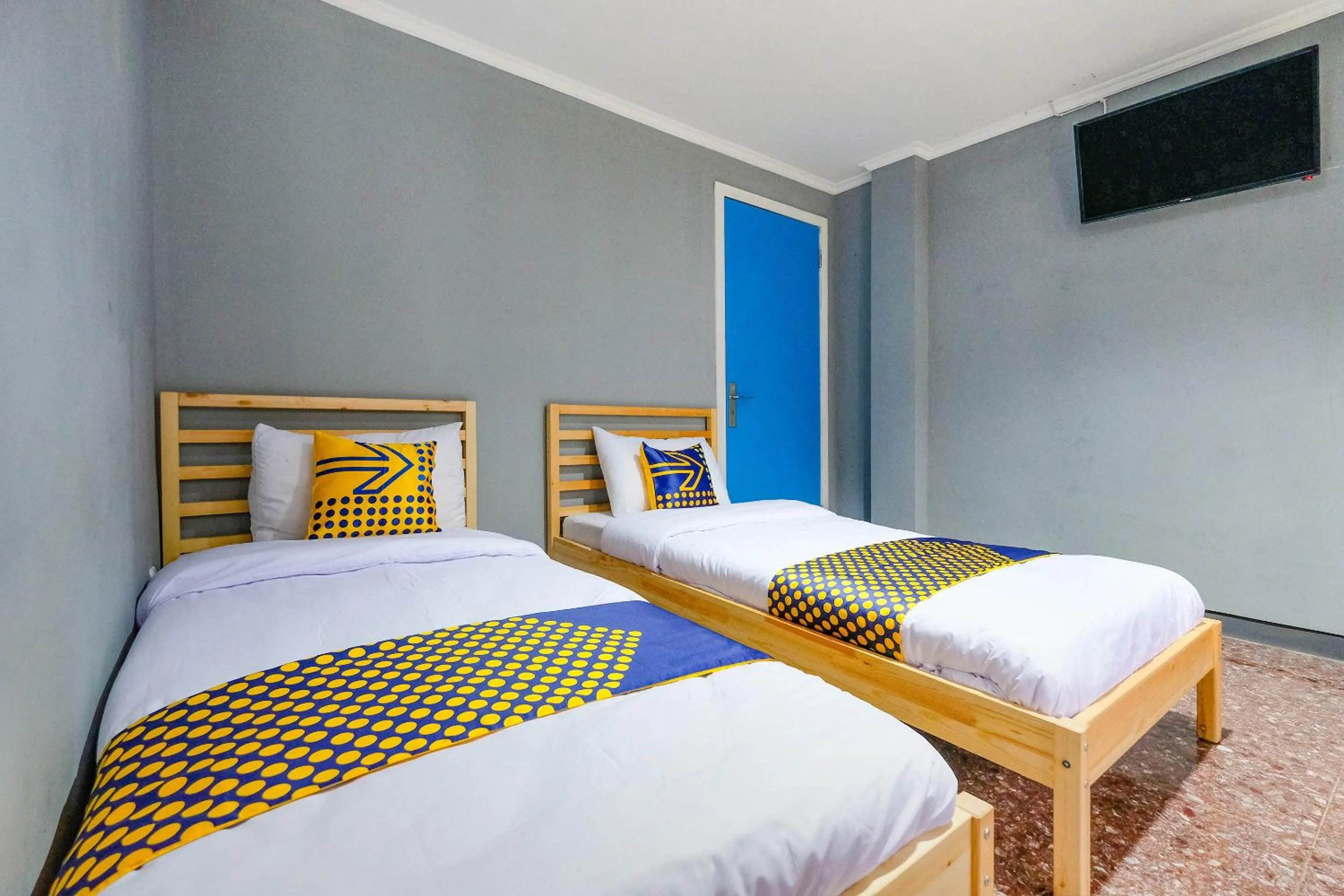 Bedroom in SPOT ON 2281 Omajo