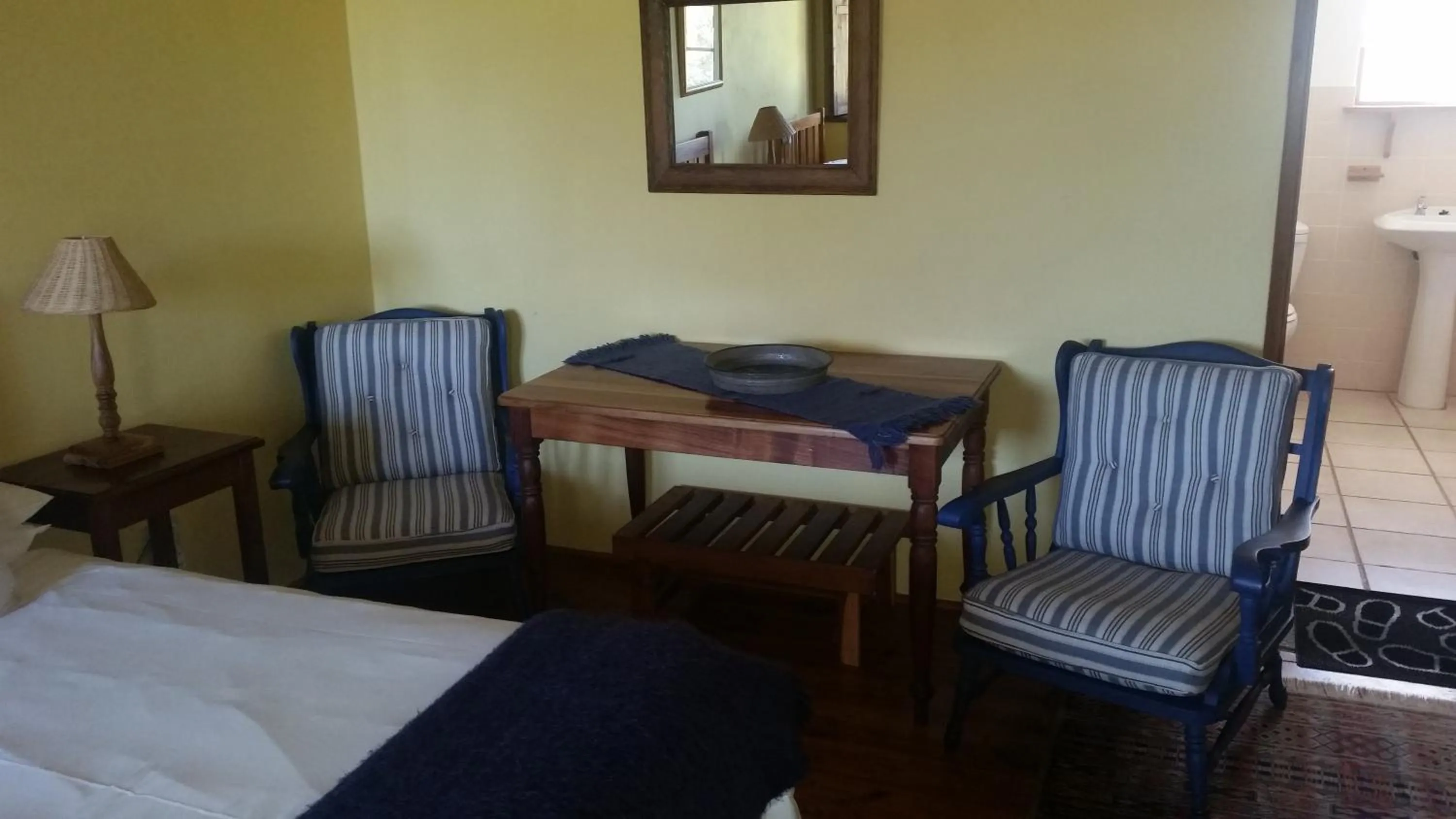 Seating area, Bed in Over The Mountain Guest Farm