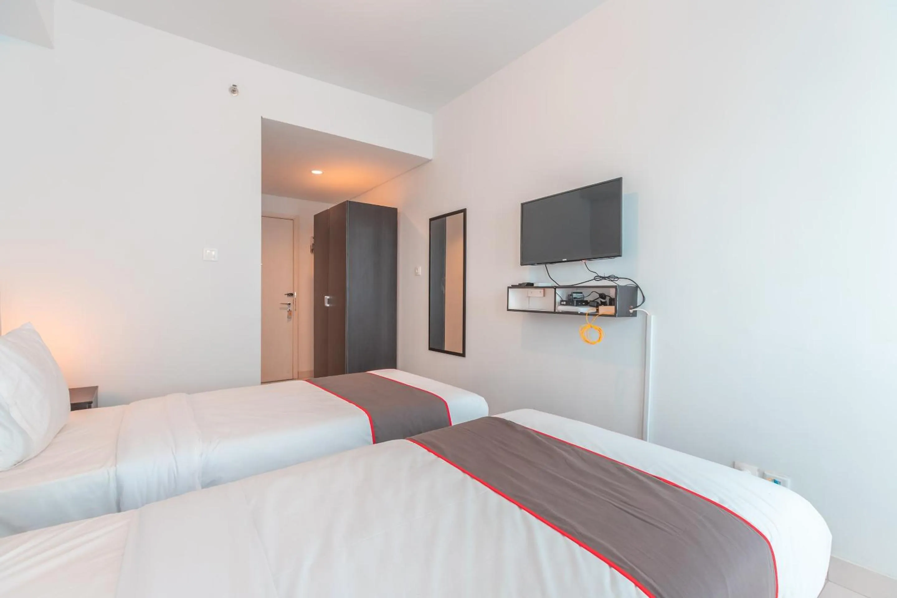 Bedroom in Capital O Urbano