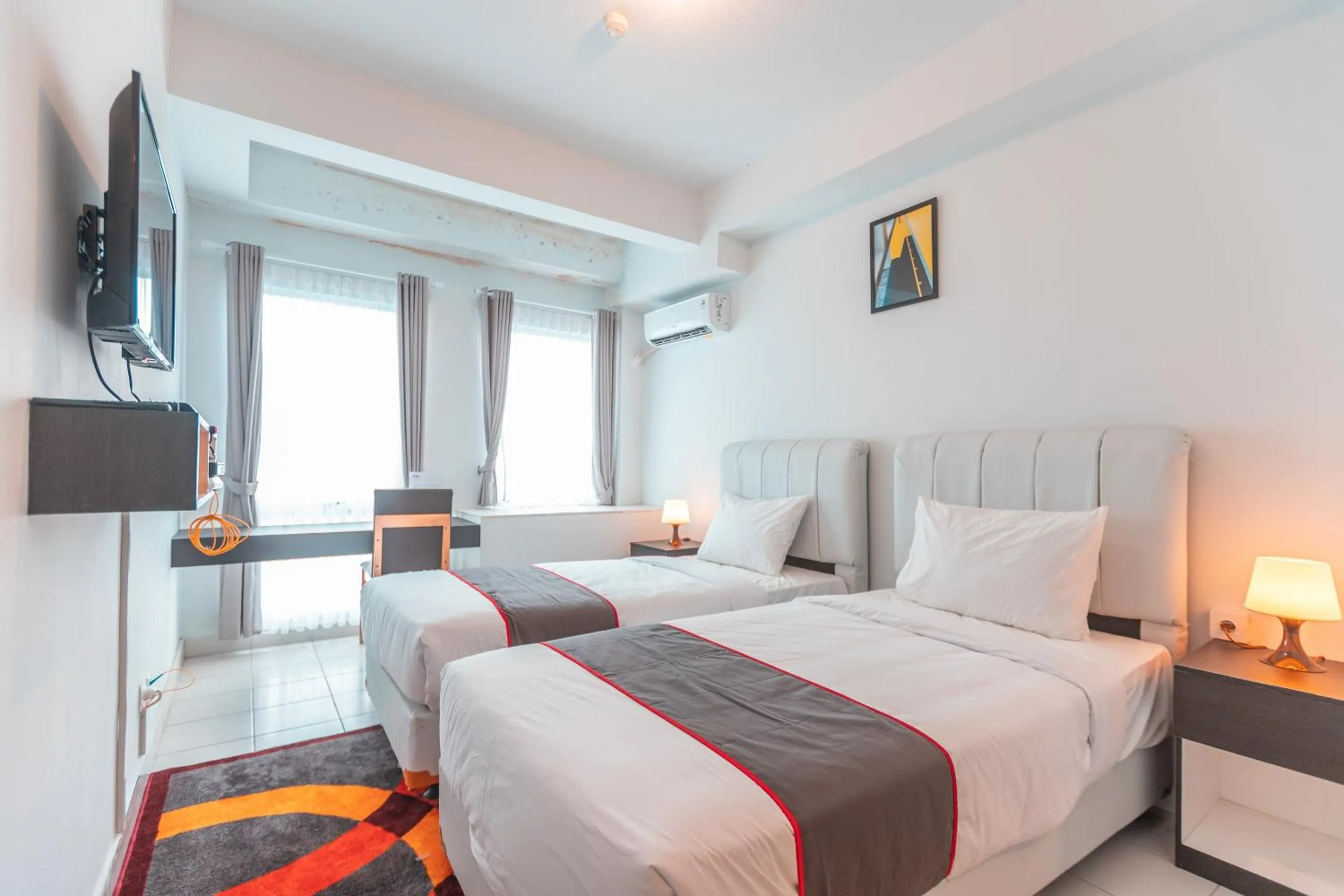 Bedroom in Capital O Urbano