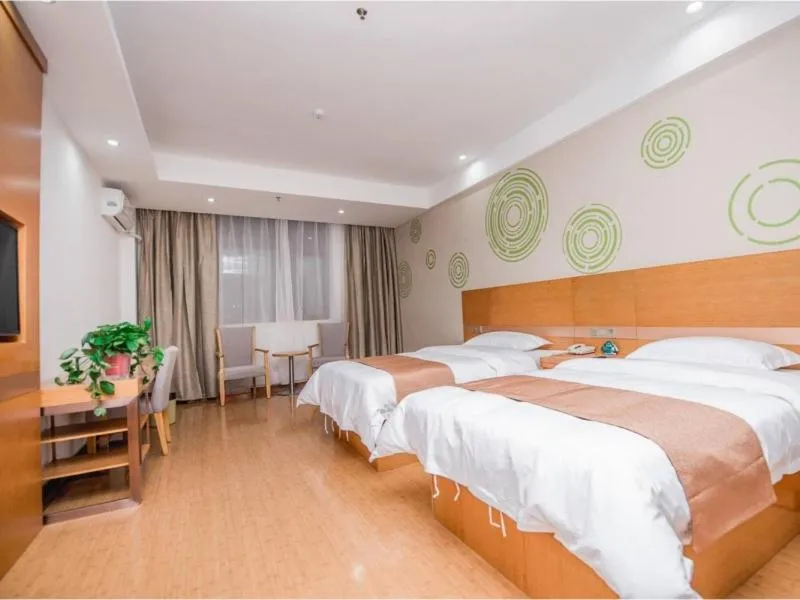 Bed in GreenTree Inn Xuchang Yucheng County Ziyun Avenue Business Hotel