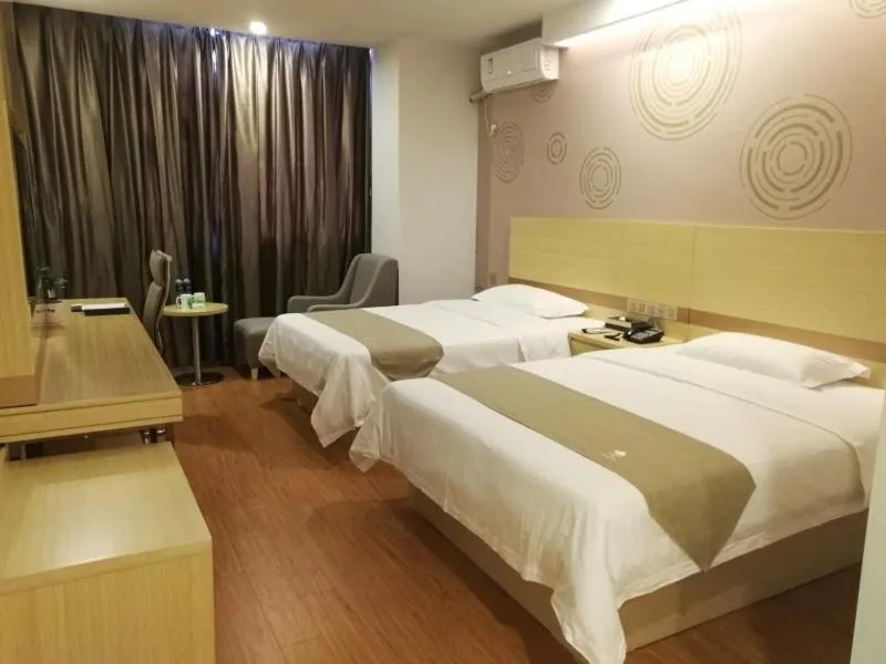 Bed in GreenTree Inn Chizhou Shitai County Government Affairs New District Business Hotel