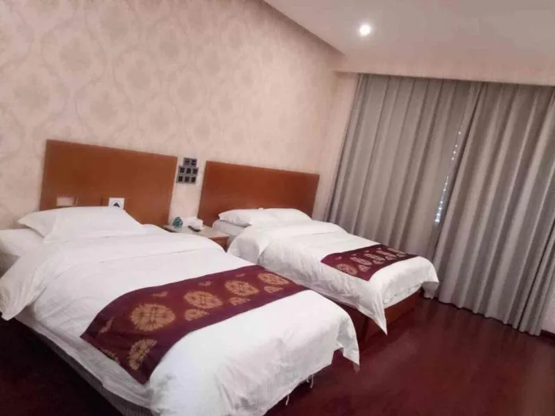 Bed in GreenTree Inn Ziyang Lezhi Government Tianchi Town Express Hotel